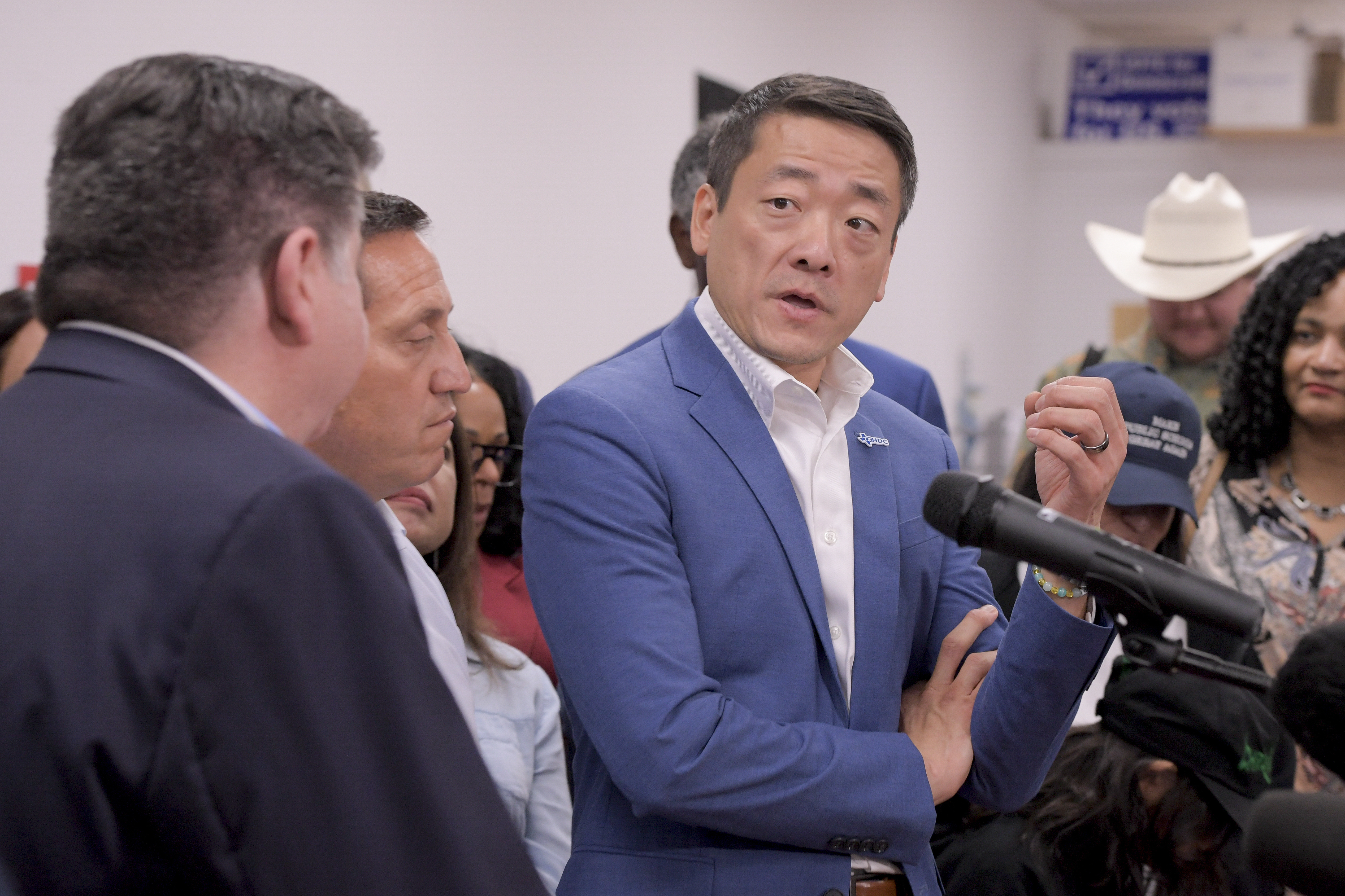 Texas House Democratic Caucus Chair Gene Wu along with other members of the Texas House are joined by Illinois Governor JB Pritzker as they speak about Texas Republican plans to redraw the House map office during a press conference at the Democratic Party of DuPage County office in Carol Stream, IL on Sunday, Aug. 3, 2025. (AP Photo/Mark Black)