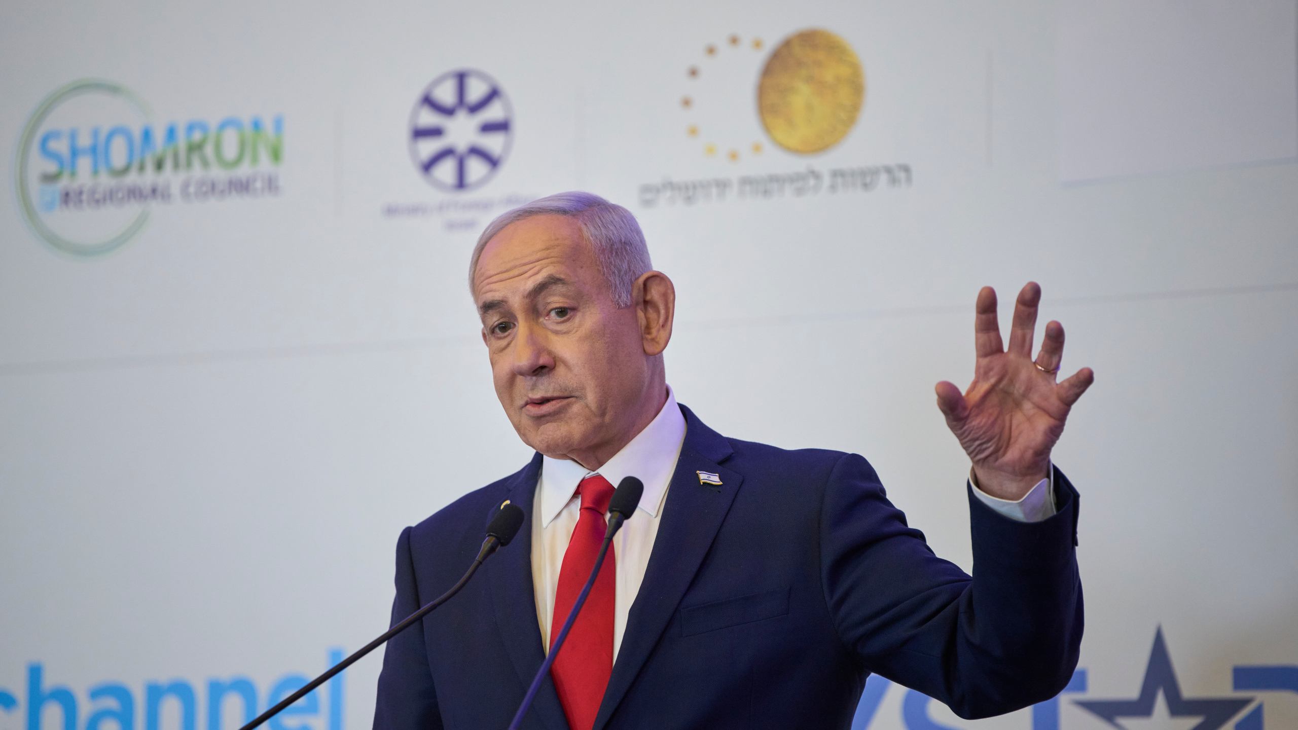 Israeli Prime Minister Benjamin Netanyahu speaks to the audience at a conference in Jerusalem, Sunday, July 27, 2025. (AP Photo/Ohad Zwigenberg)