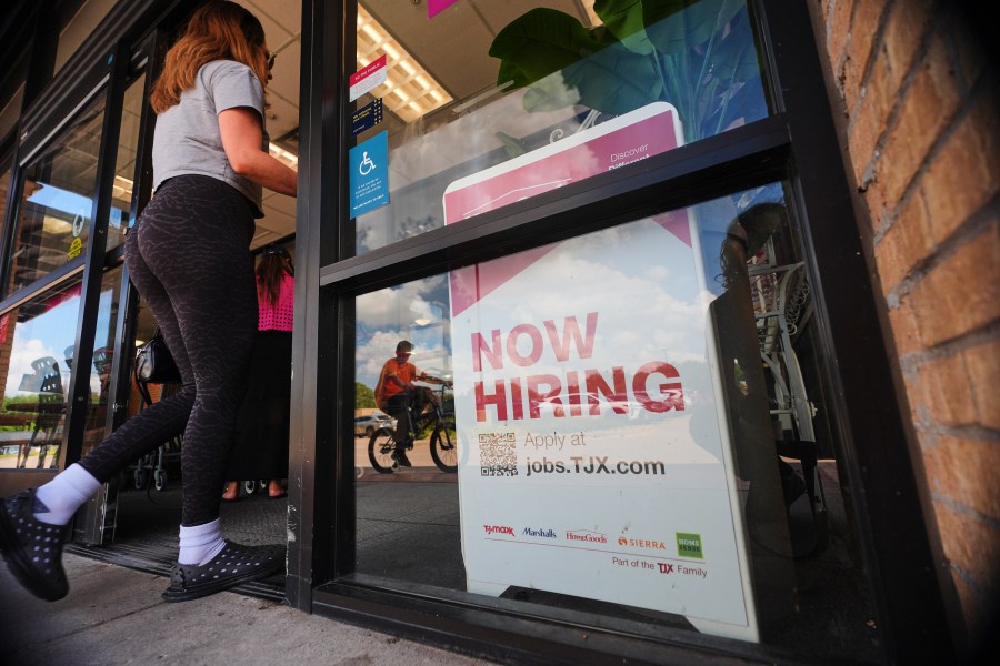 FILE- A sign announces hiring, July 15, 2025, in Richardson, Texas. (AP Photo/LM Otero, File)