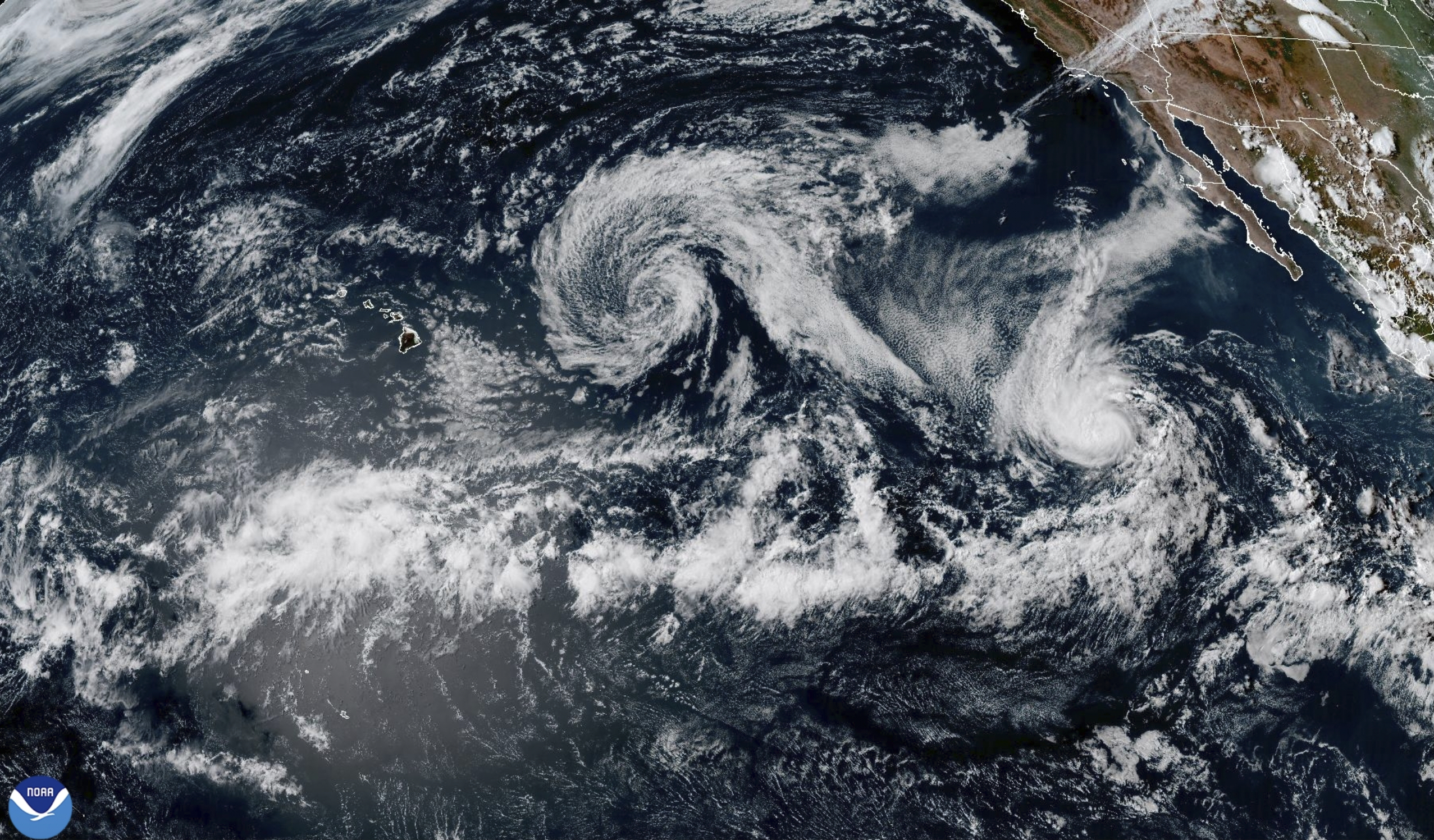 This satellite photo provided by NOAA shows Tropical Storm Henriette in the Pacific on Monday, Aug. 4, 2025. (NOAA via AP)
