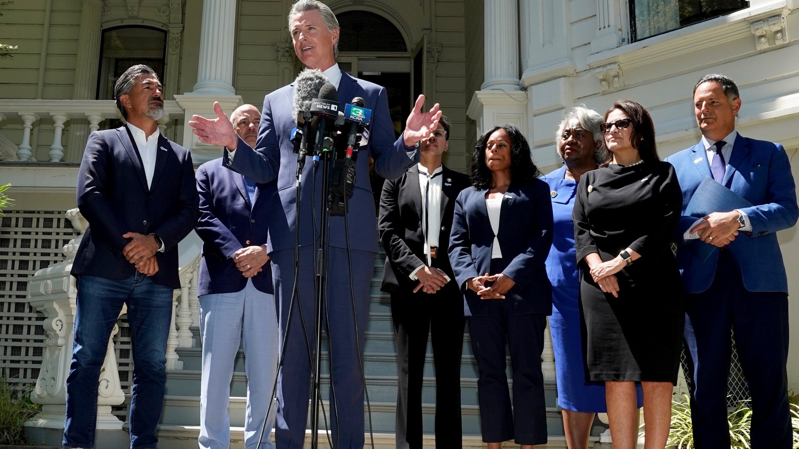 FILE - California Gov. Gavin Newsom, accompanied by several members of the Texas state Legislature, calls for a new way for California to redraw its voting districts, during a news conference In Sacramento, Calif., Friday July 25, 2025. (AP Photo by Rich Pedroncelli,File)