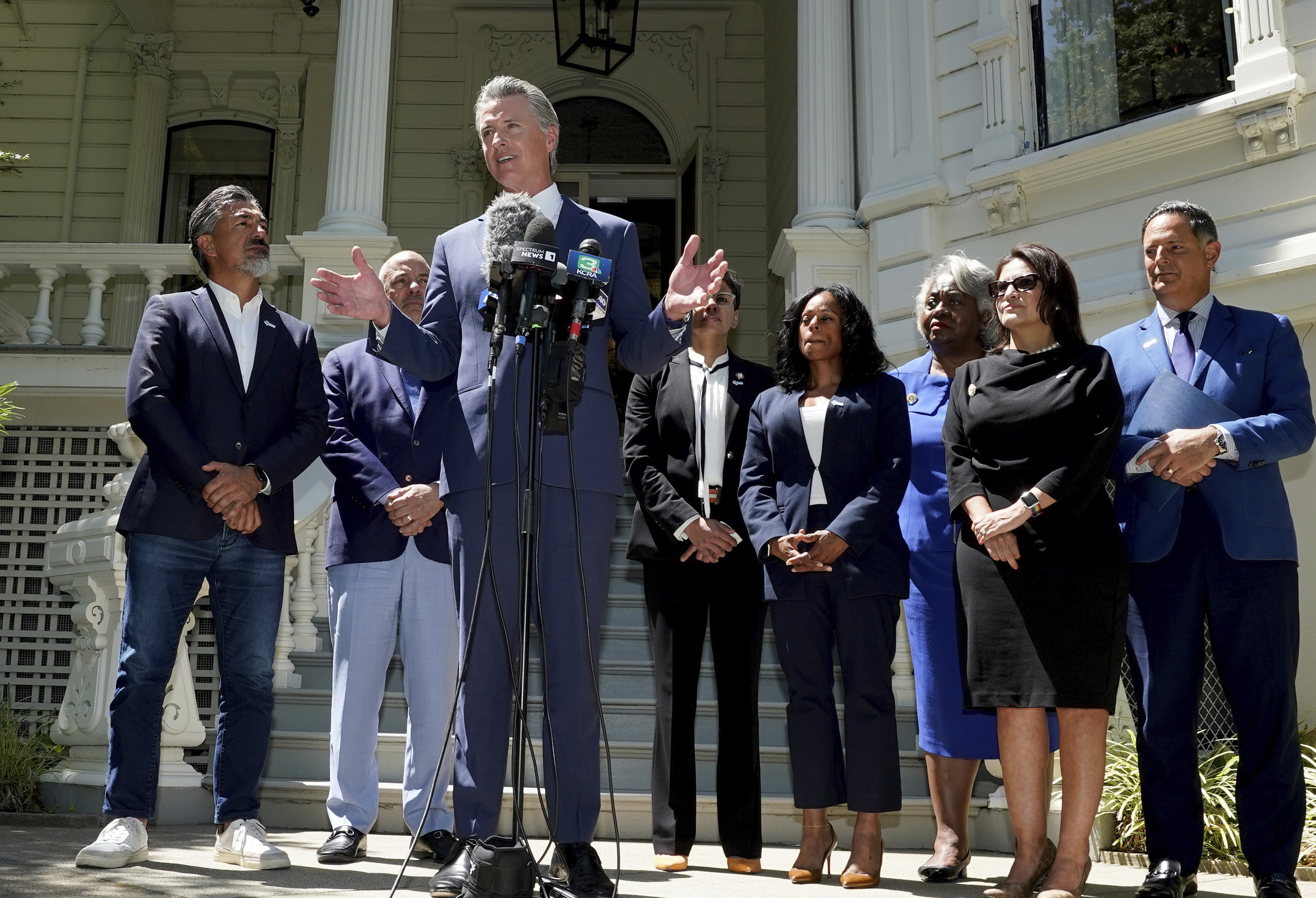 FILE - California Gov. Gavin Newsom, accompanied by several members of the Texas state Legislature, calls for a new way for California to redraw its voting districts, during a news conference In Sacramento, Calif., Friday July 25, 2025. (AP Photo by Rich Pedroncelli,File)