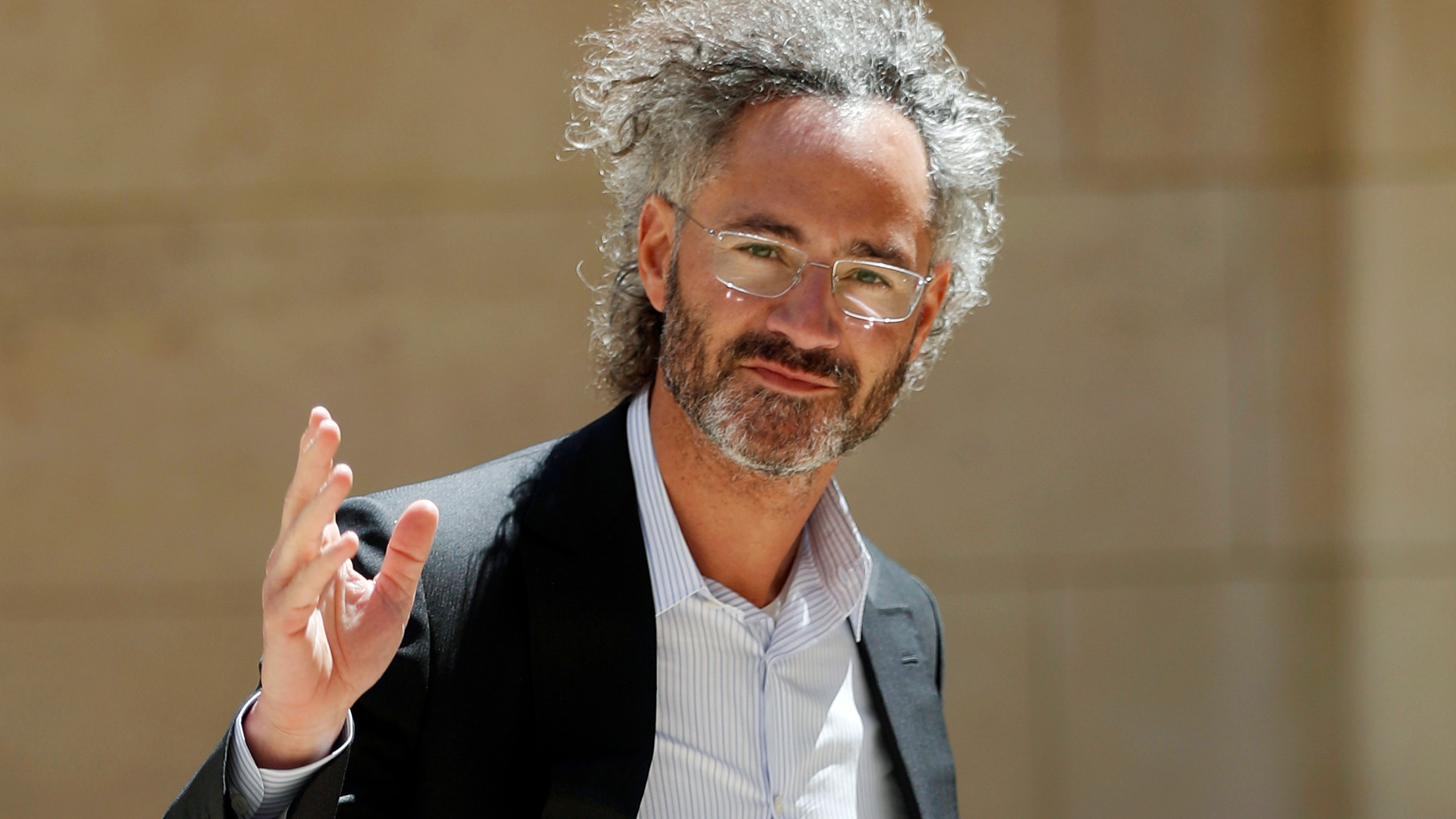 FILE - In this Wednesday, May 15, 2019, file photo, Palantir CEO Alex Karp arrives for the Tech for Good summit in Paris. (AP Photo/Thibault Camus, File)