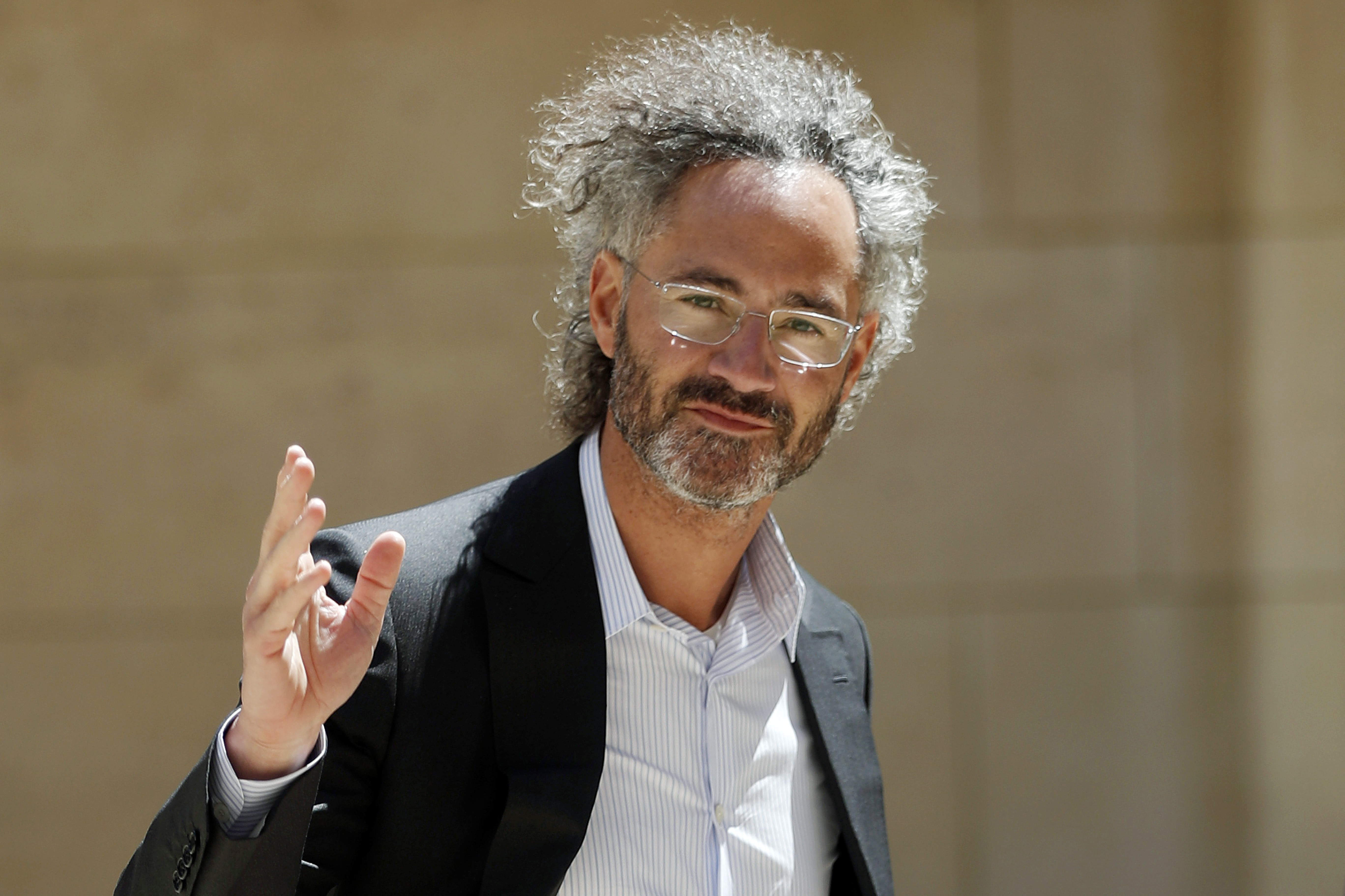 FILE - In this Wednesday, May 15, 2019, file photo, Palantir CEO Alex Karp arrives for the Tech for Good summit in Paris. (AP Photo/Thibault Camus, File)