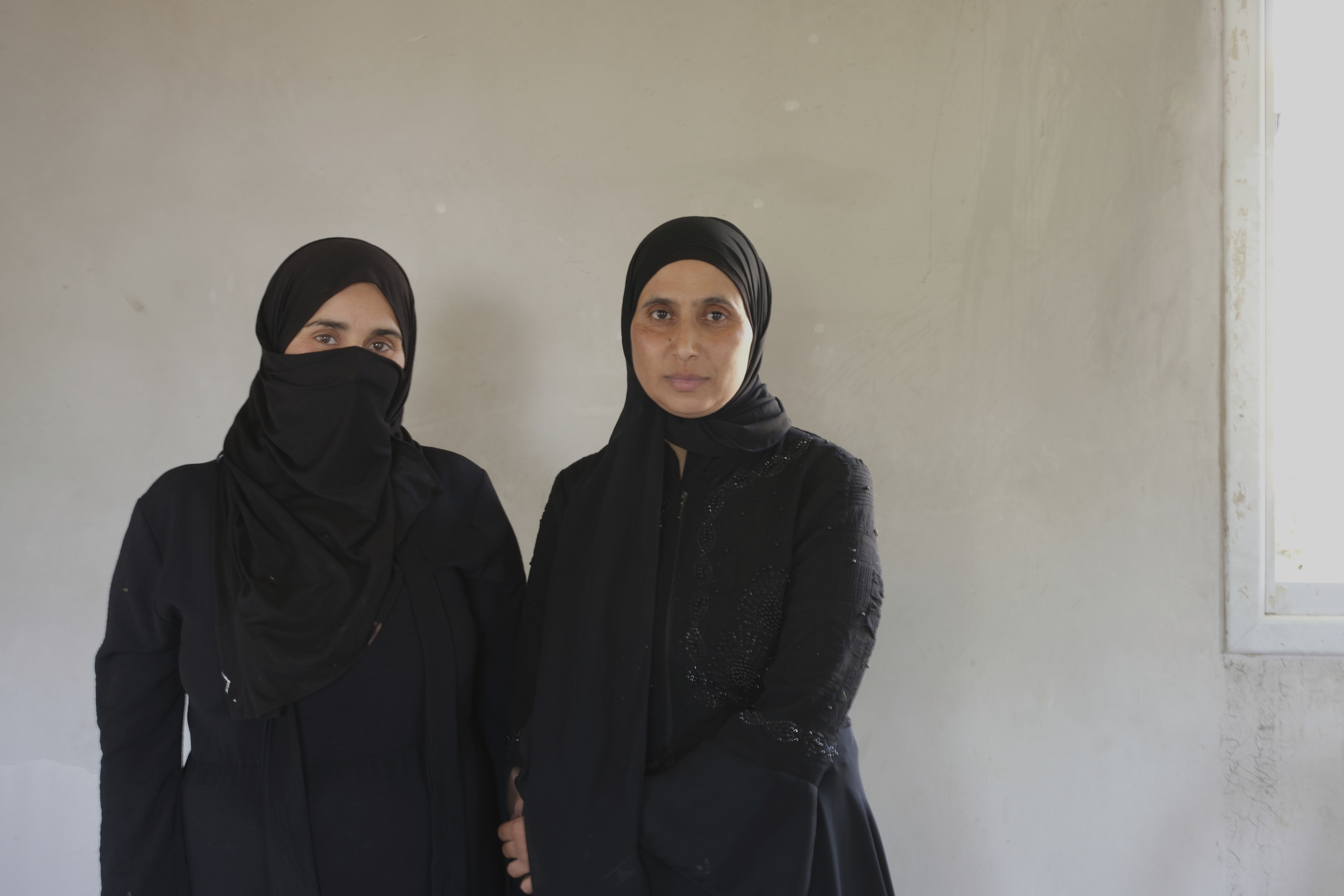 Sara Hathaleen and Myassar Hathaleen, two of dozens of Bedouin women on a hunger strike demanding that Israel return the body of a Palestinian activist killed during a clash with a Jewish settler, are seen in Umm al-Khair, West Bank, Monday, Aug. 4, 2025. (AP Photo/Julia Frankel)