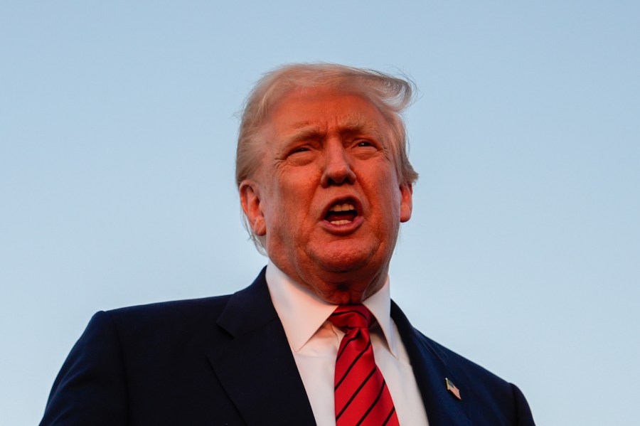 President Donald Trump speaks with reporters before boarding Air Force One at Lehigh Valley International Airport, Sunday, Aug. 3, 2025, in Allentown, Pa. (AP Photo/Julia Demaree Nikhinson)