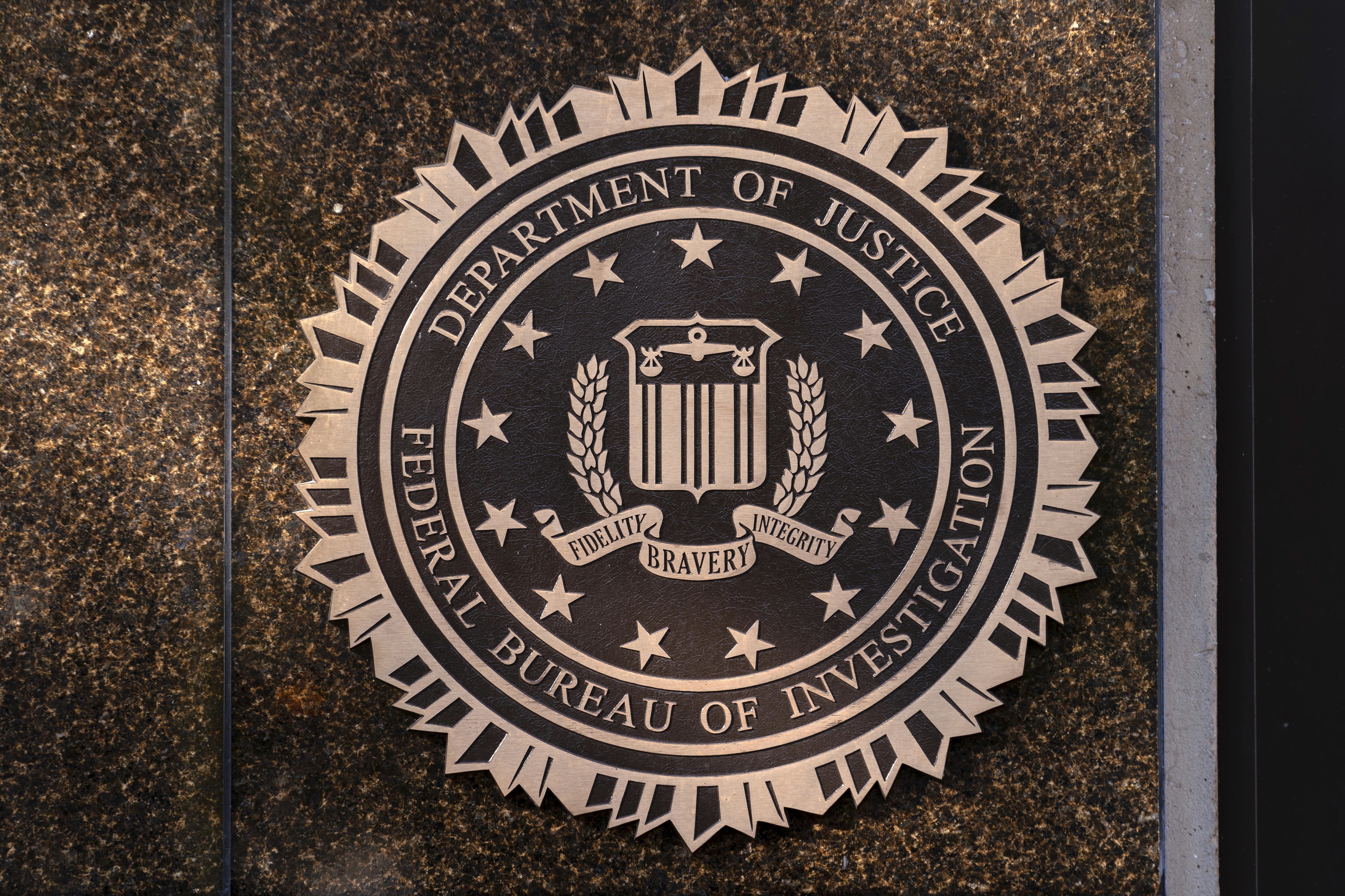FILE - The seal of The Federal Bureau of Investigation is seen on the Headquarters in Washington, Nov. 18, 2024. (AP Photo/Jose Luis Magana, File)