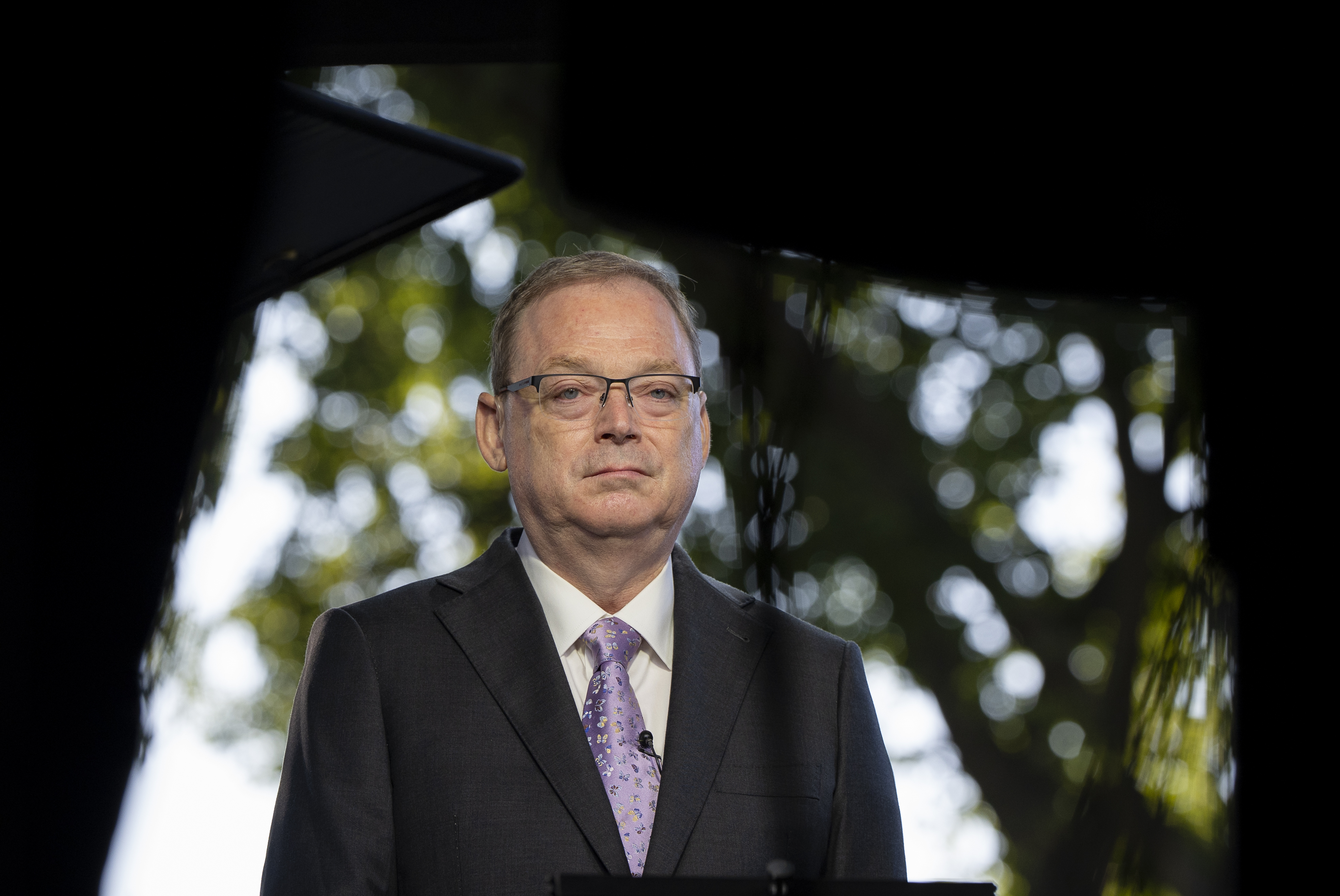 Director of the White House National Economic Council Kevin Hassett does a television interview at the White House, Monday, Aug. 4, 2025, in Washington. (AP Photo/Alex Brandon)