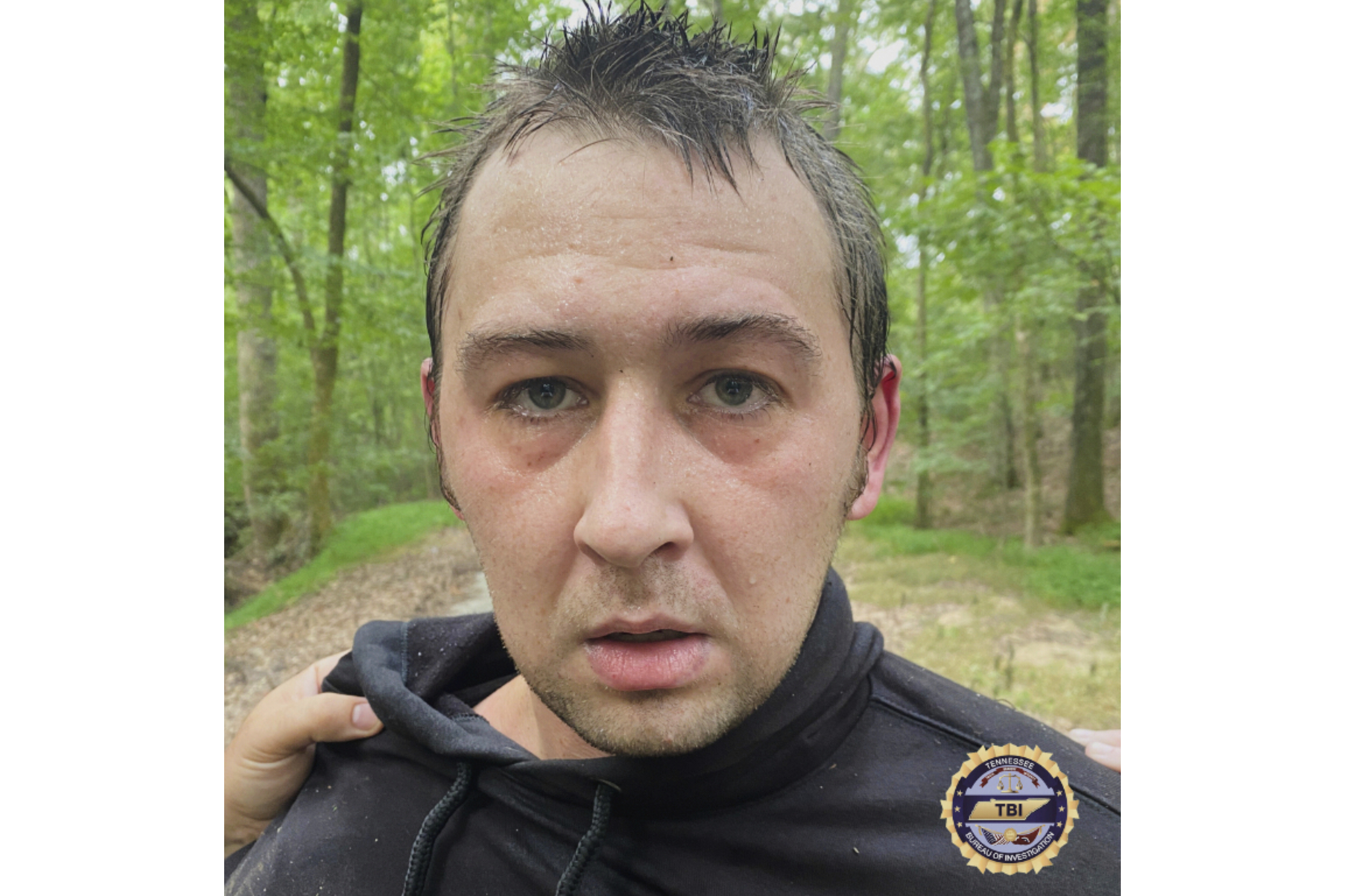 This photo provided by Tennessee Bureau of Investigation on Tuesday, Aug. 5, 2025 shows Austin Drummond, moments after having been taken into custody. (Tennessee Bureau of Investigation via AP)