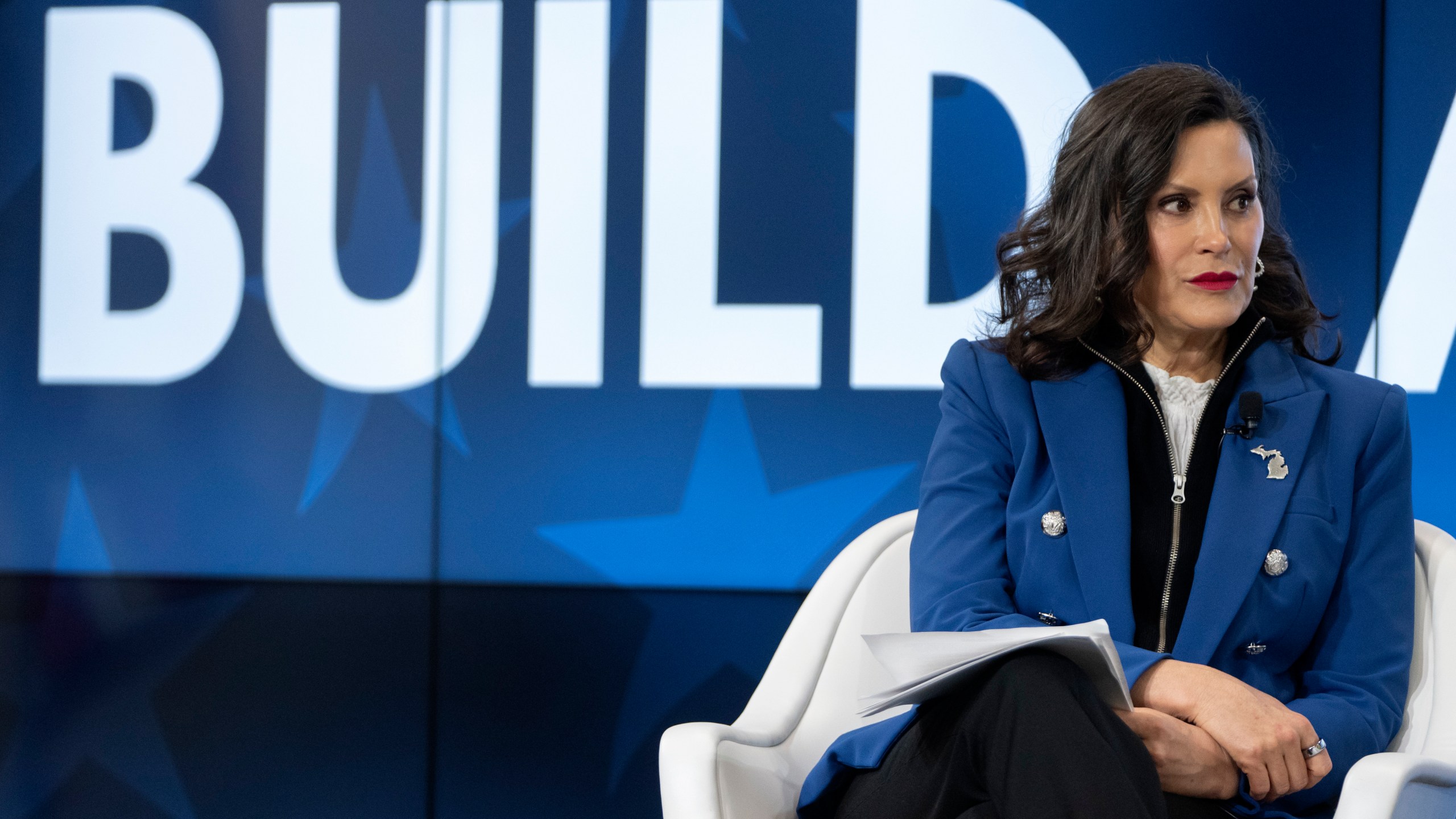 FILE - Michigan Gov. Gretchen Whitmer speaks with former television journalist Gretchen Carlson, not shown, at an event on April 9, 2025, in Washington. (AP Photo/Mark Schiefelbein, File)