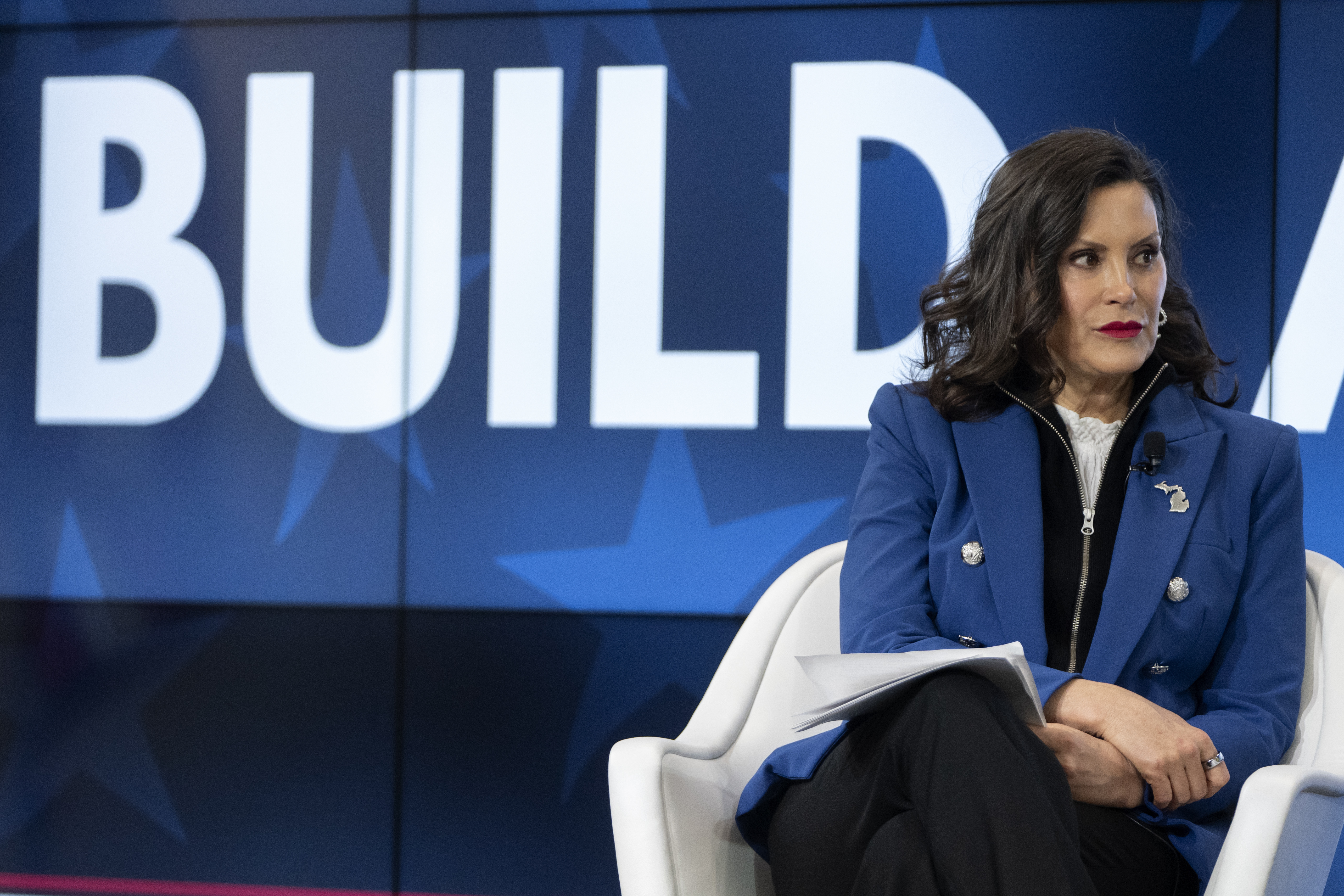 FILE - Michigan Gov. Gretchen Whitmer speaks with former television journalist Gretchen Carlson, not shown, at an event on April 9, 2025, in Washington. (AP Photo/Mark Schiefelbein, File)