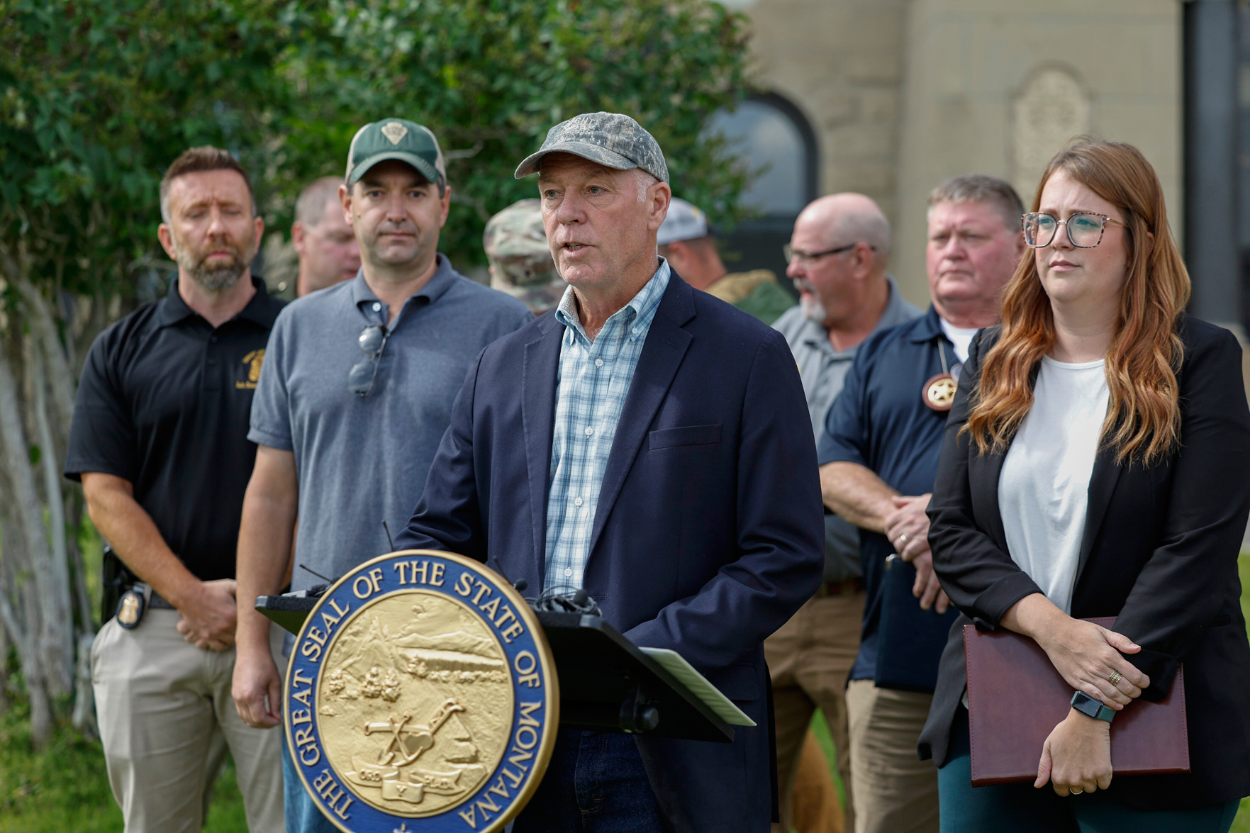 Montana Gov. Greg Gianforte, center, speaks to the press on Tuesday, Aug. 5, 2025 at the Anaconda-Deer Lodge County Courthouse regarding a shooting at the Owl Bar in Anaconda, Mont. last Friday. (Joseph Scheller/The Montana Standard via AP)