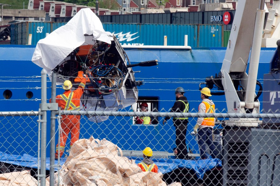 FILE - Debris from the Titan submersible, recovered from the ocean floor near the wreck of the Titanic, is unloaded from the ship Horizon Arctic at the Canadian Coast Guard pier in St. John's, Newfoundland, Wednesday, June 28, 2023. (Paul Daly/The Canadian Press via AP, File)