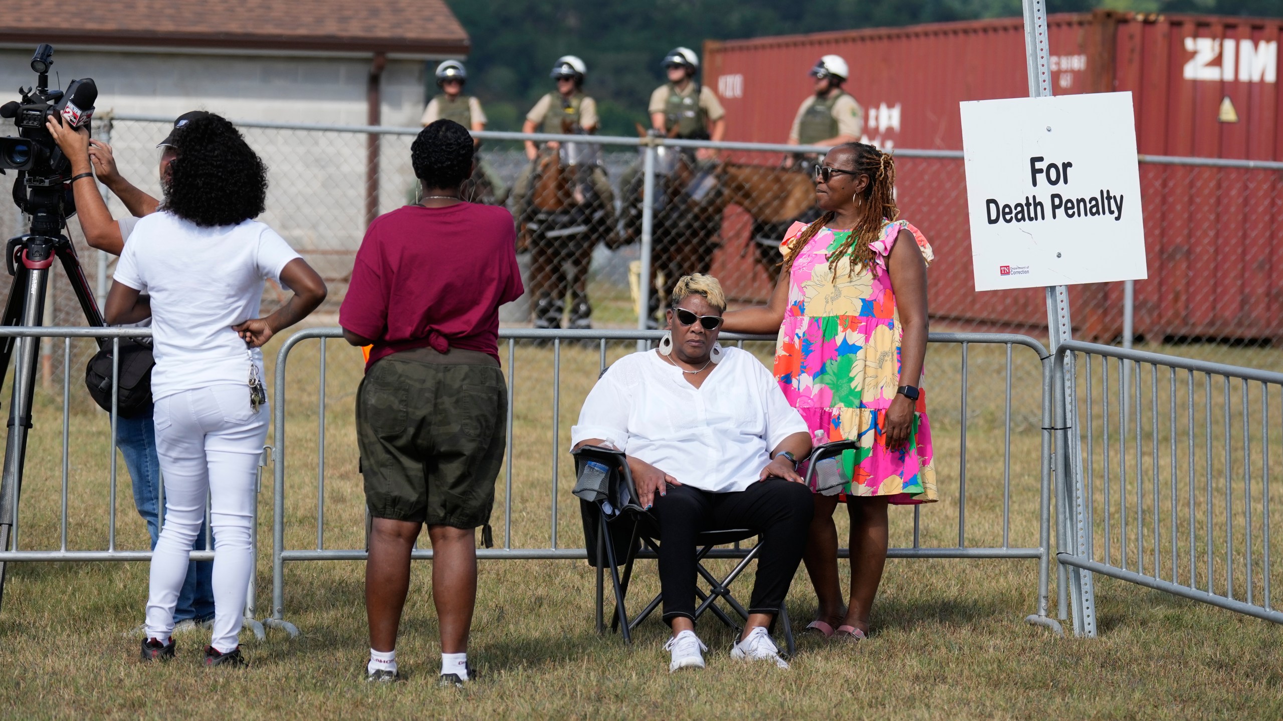 Relatives of the victims of convicted murderer Byron Black stay in the area reserved for pro-death penalty advocates outside Riverbend Maximum Security Institution before the execution of Black, Tuesday, Aug. 5, 2025, in Nashville, Tenn. (AP Photo/Mark Humphrey)