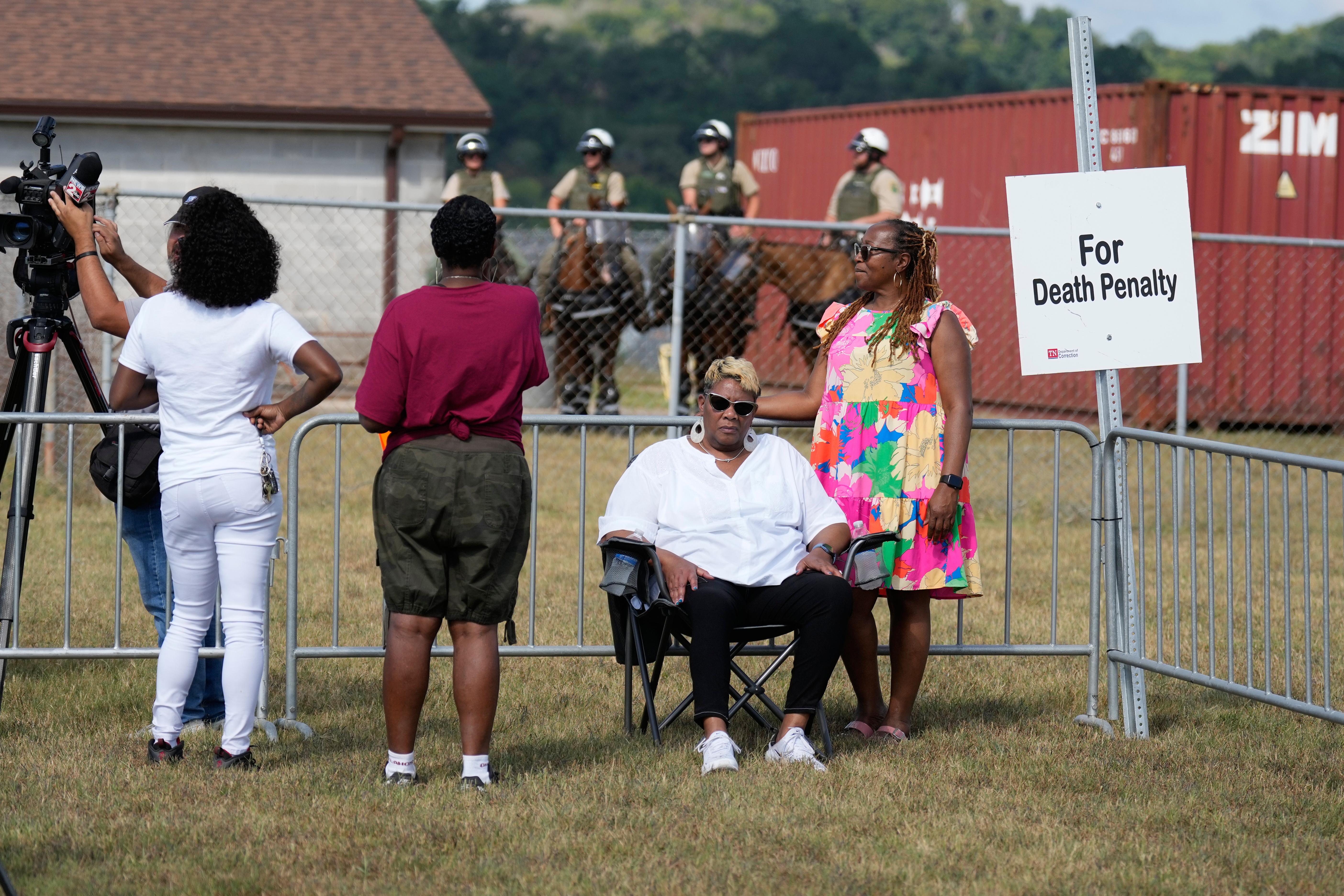 Relatives of the victims of convicted murderer Byron Black stay in the area reserved for pro-death penalty advocates outside Riverbend Maximum Security Institution before the execution of Black, Tuesday, Aug. 5, 2025, in Nashville, Tenn. (AP Photo/Mark Humphrey)