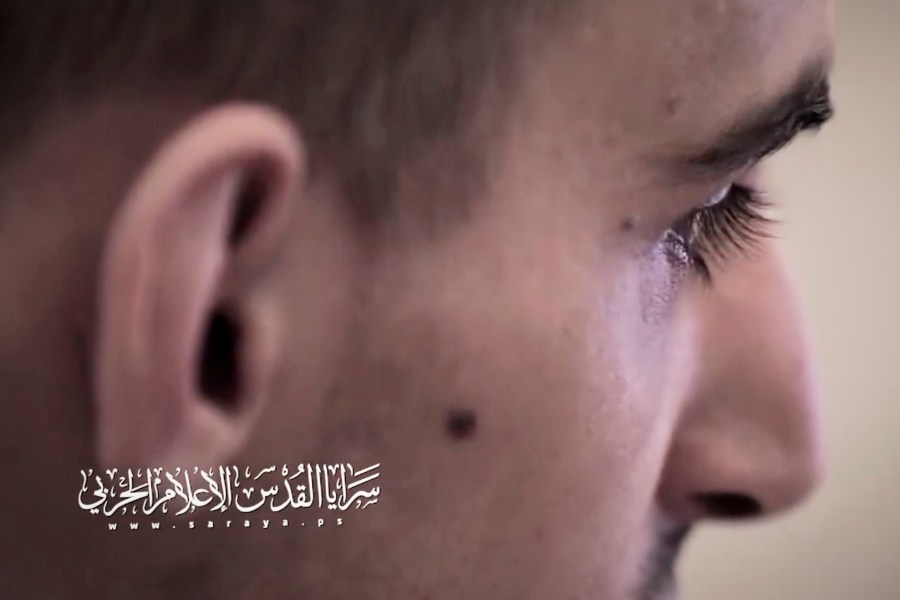 This screengrab from an undated video, released on July 31, 2025, by the Islamic Jihad militant group, shows Israeli hostage Rom Braslavsky while being filmed by his captors at an undisclosed location in the Gaza Strip. Braslavsky was abducted during the Hamas-led attack on October 7, 2023. Bottom left reads in Arabic "Al-Quds Brigades, war media."(Islamic Jihad via AP)