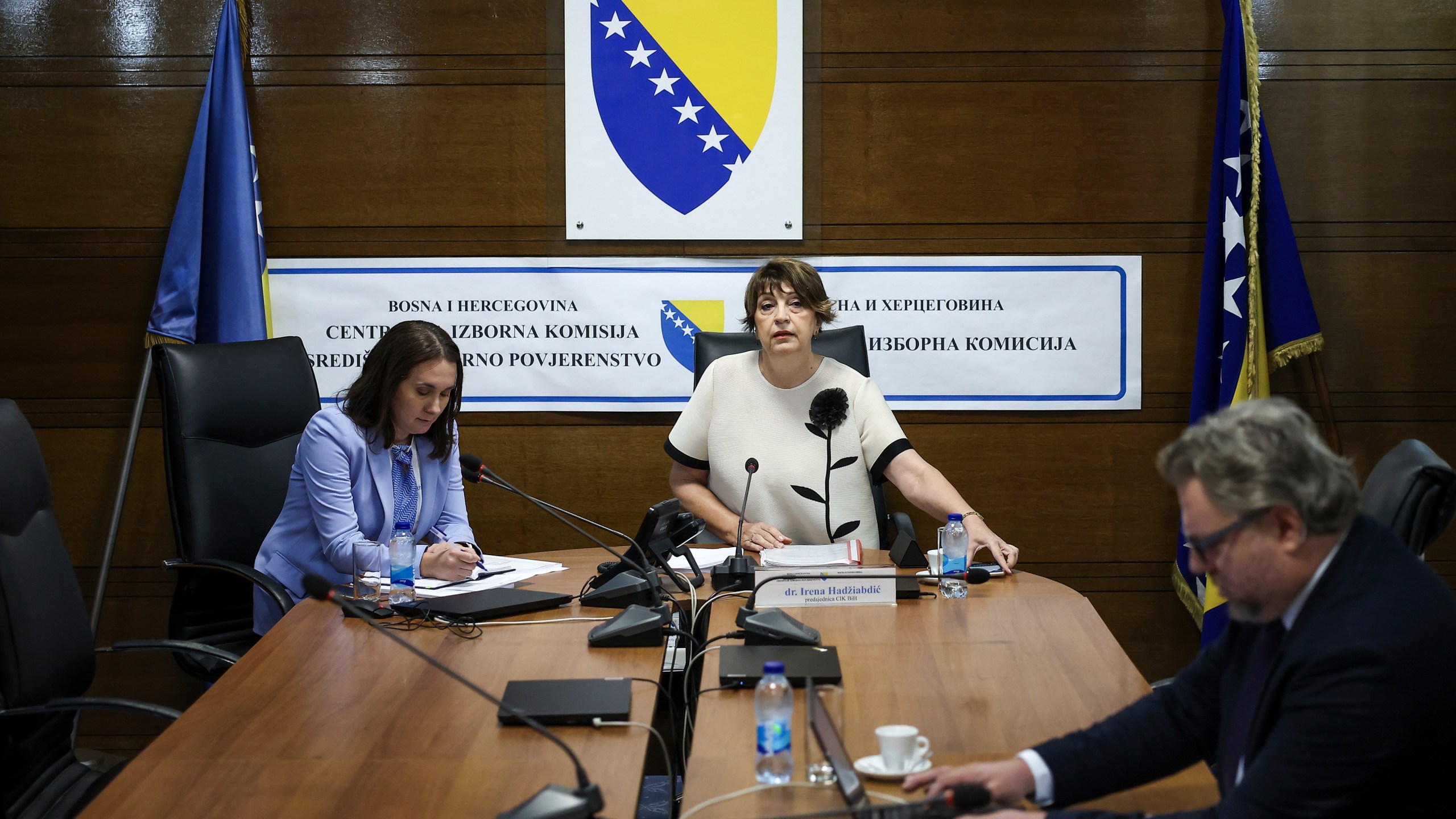 Members of the Central Election Commission of Bosnia and Herzegovina, prepare for a session discussing the potential removal of separatist Bosnian Serb leader Milorad Dodik from his position as president of the Serb entity in Bosnia, following an appeals court verdict that sentenced him to one year in jail and imposed a six-year ban on all political activities, in Sarajevo, Bosnia, Wednesday, Aug. 6, 2025. (AP Photo/Armin Durgut)