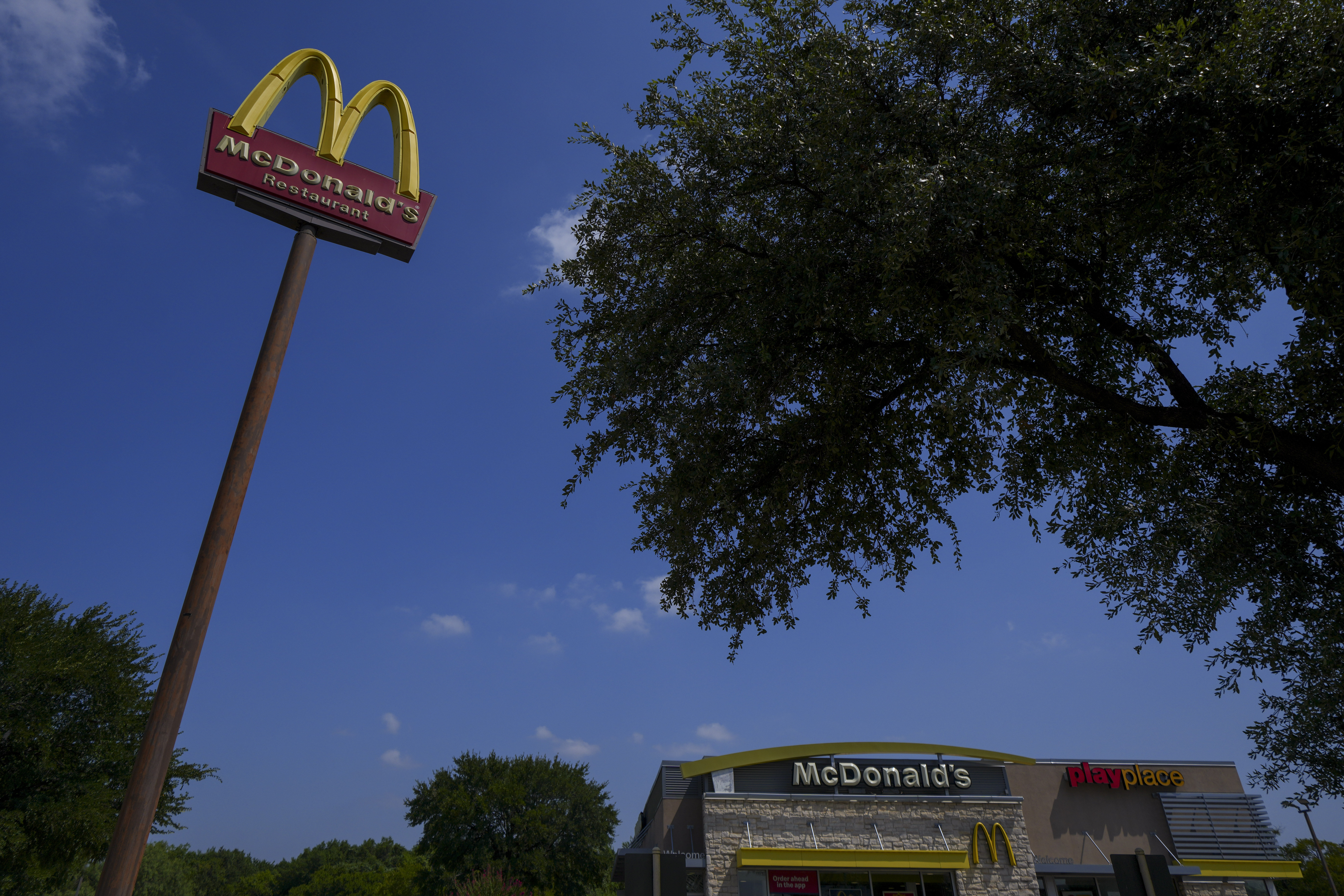 A McDonald's restaurant is visible Tuesday, Aug. 5, 2025, in Arlington, Texas. (AP Photo/Julio Cortez)