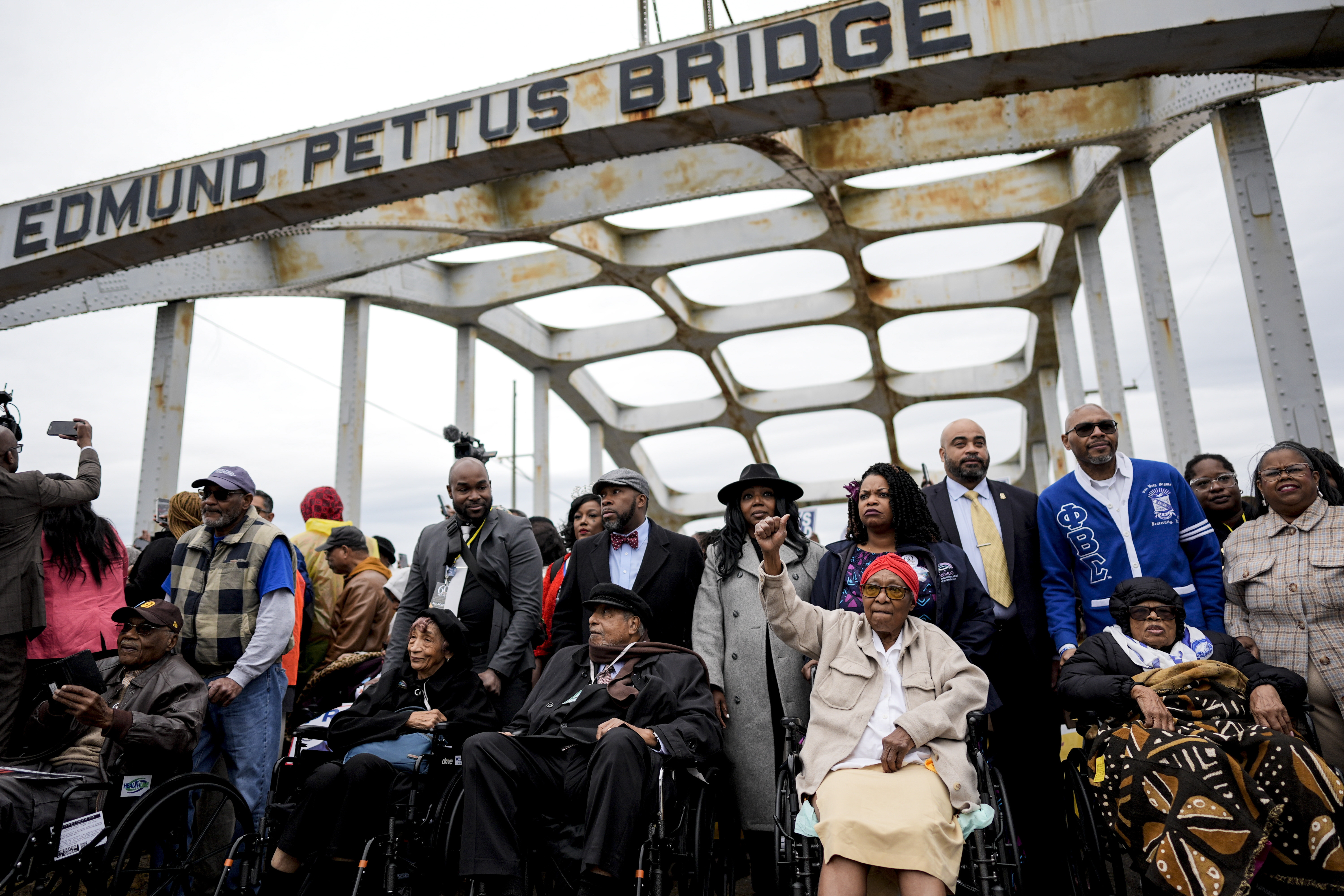 FILE - The foot soldiers are helped across the Edmund Pettus bridge during the 60th anniversary of Bloody Sunday, March 9, 2025, in Selma, Ala. (AP Photo/Mike Stewart, File)