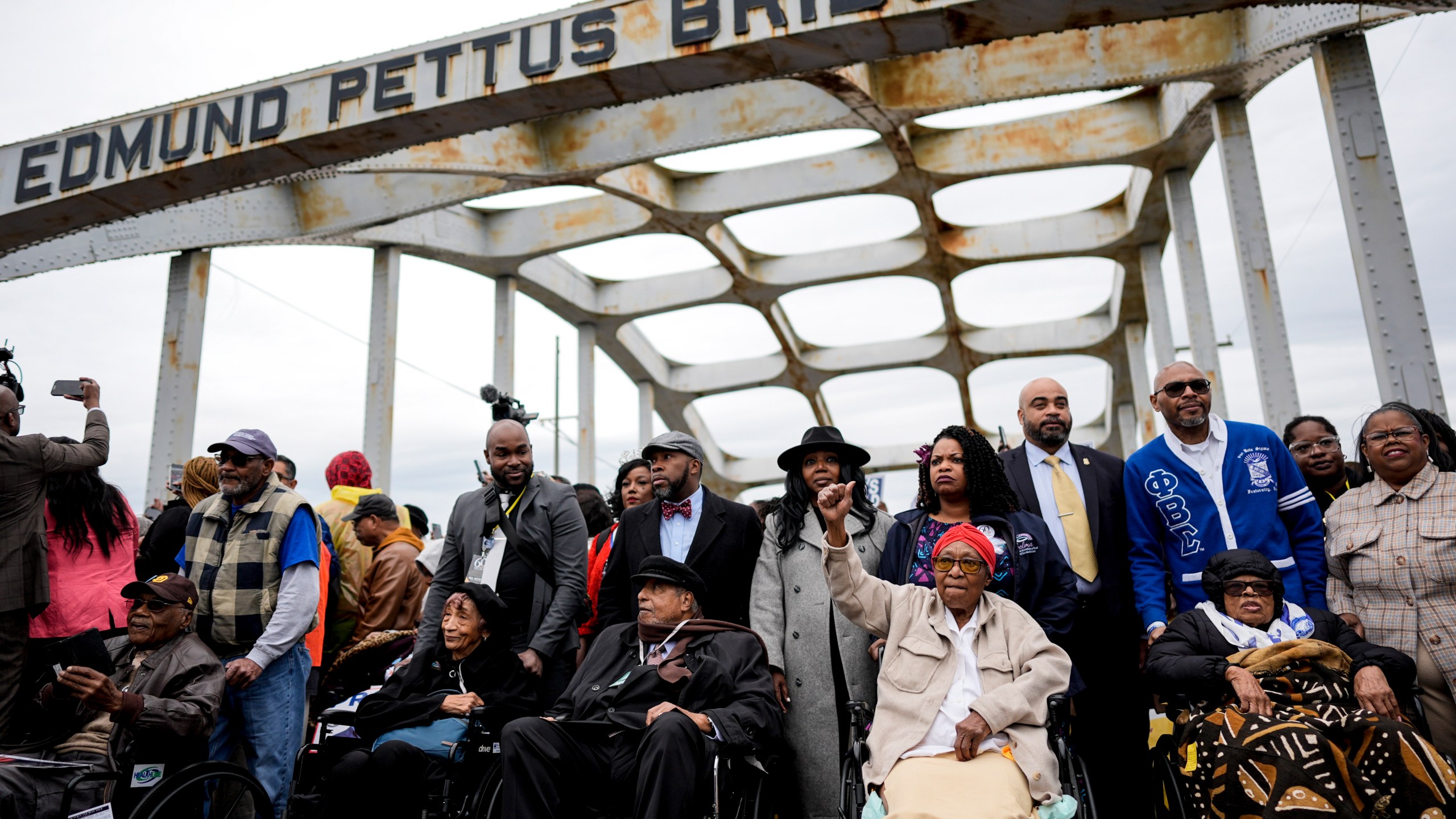 FILE - The foot soldiers are helped across the Edmund Pettus bridge during the 60th anniversary of Bloody Sunday, March 9, 2025, in Selma, Ala. (AP Photo/Mike Stewart, File)