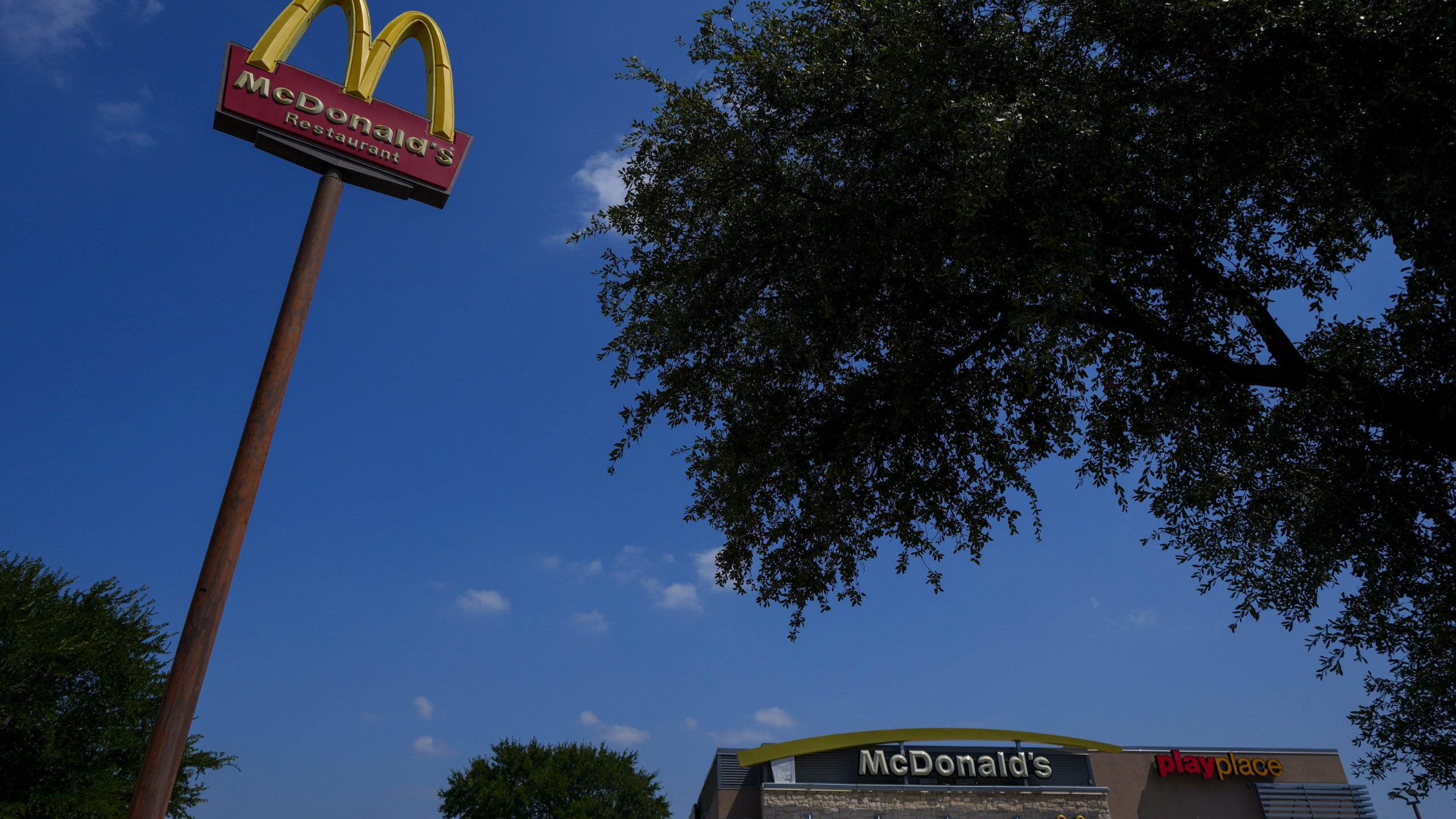 A McDonald's restaurant is visible Tuesday, Aug. 5, 2025, in Arlington, Texas. (AP Photo/Julio Cortez)