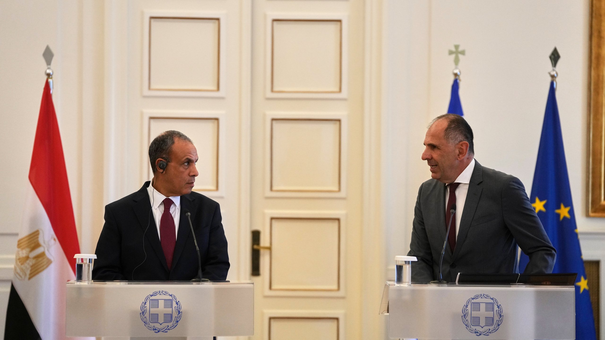 Egyptian Foreign Minister Badr Abdelatty, left, and his Greek counterpart George Gerapetritis speak to the reporters after their meeting in Athens, Greece, Wednesday, Aug. 6, 2025. (AP Photo/Thanassis Stavrakis)