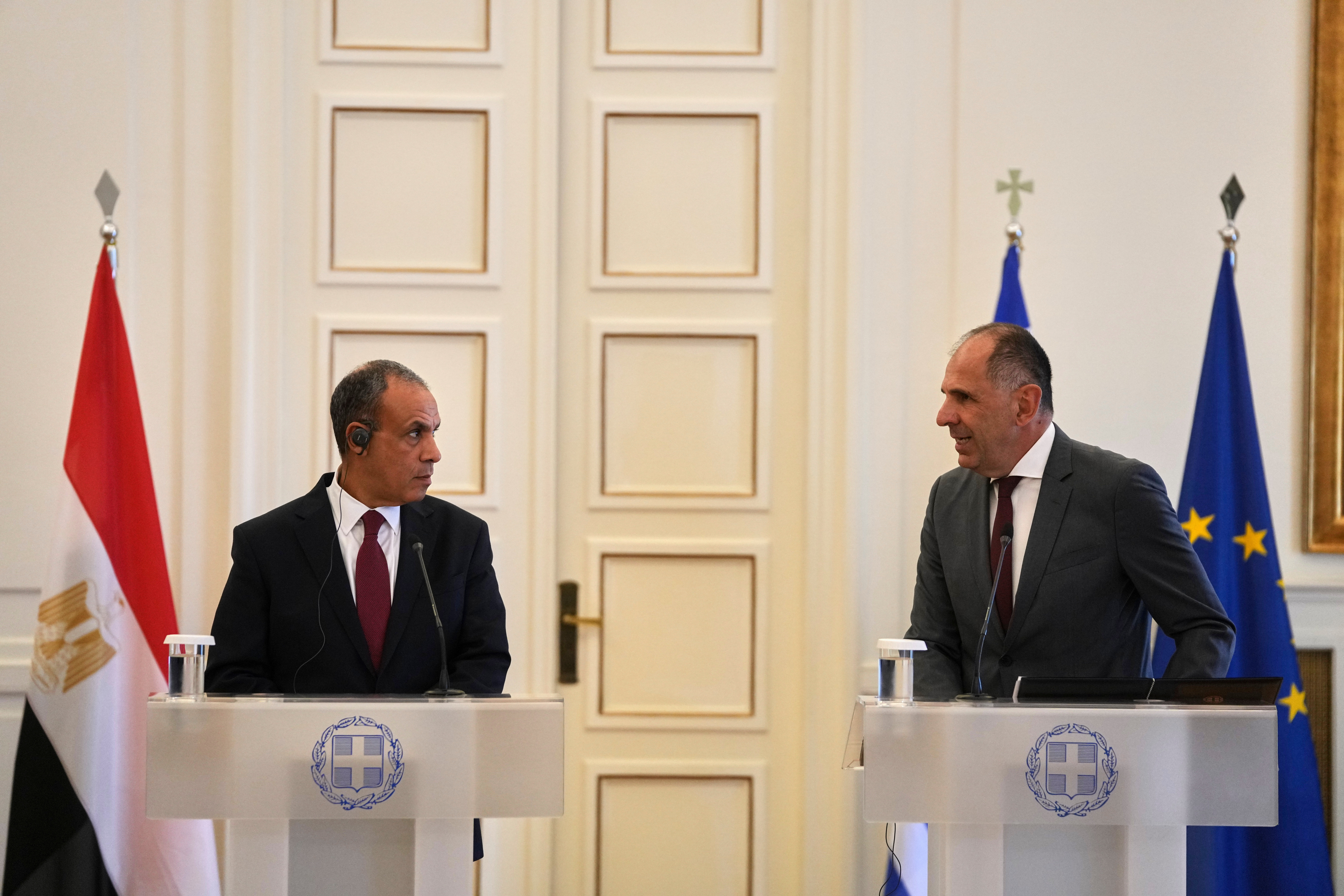Egyptian Foreign Minister Badr Abdelatty, left, and his Greek counterpart George Gerapetritis speak to the reporters after their meeting in Athens, Greece, Wednesday, Aug. 6, 2025. (AP Photo/Thanassis Stavrakis)