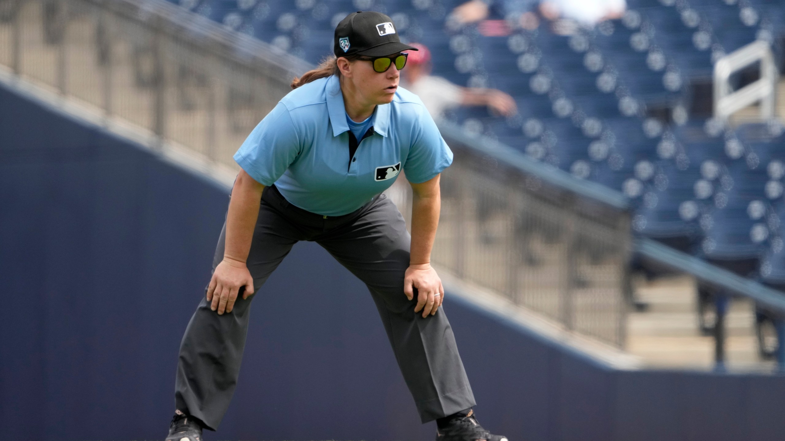 FILE - Umpire Jen Pawol takes her position during the first inning of a spring training baseball game between the St. Louis Cardinals and Washington Nationals Monday, March 4, 2024, in West Palm Beach, Fla. (AP Photo/Jeff Roberson, File)