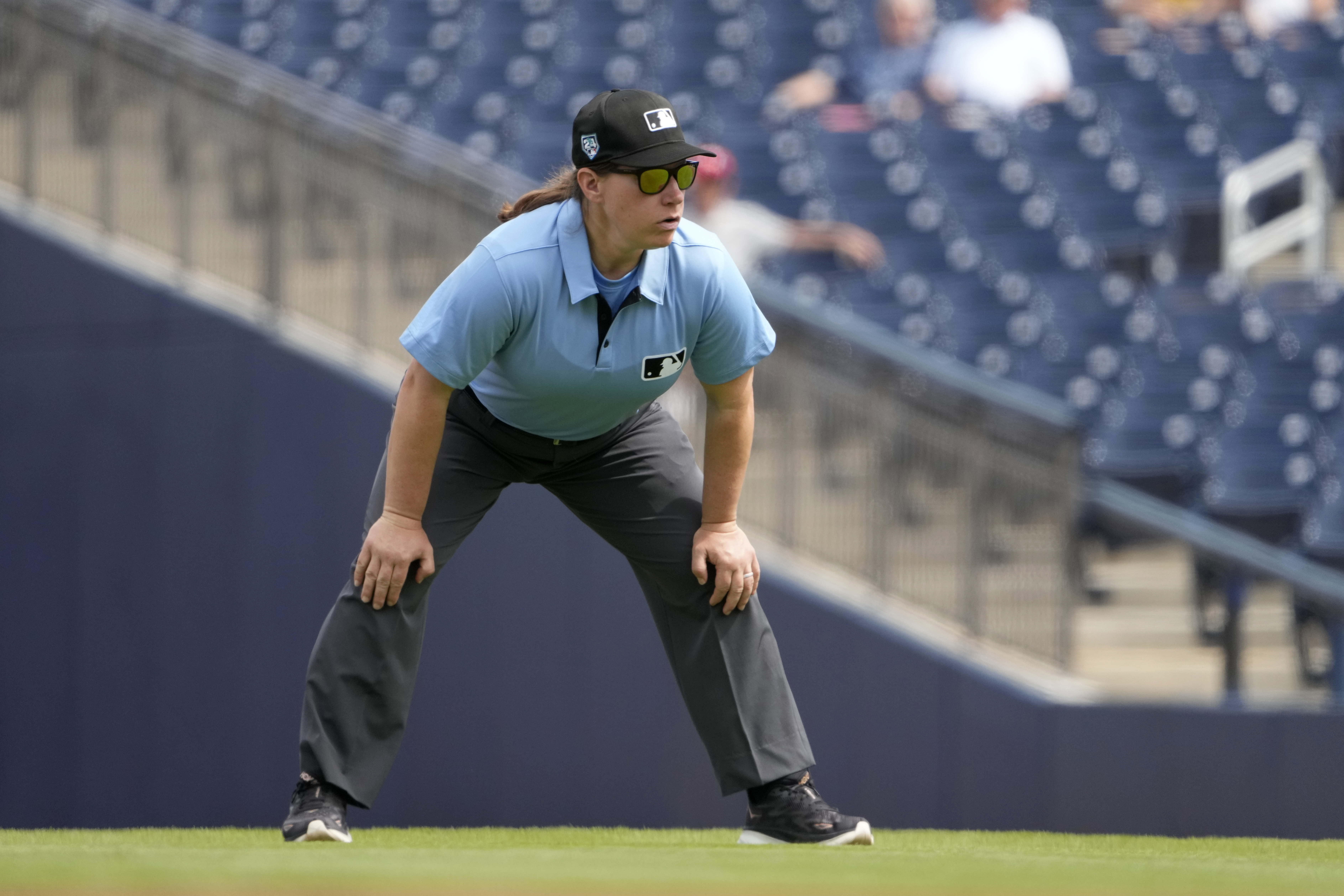 FILE - Umpire Jen Pawol takes her position during the first inning of a spring training baseball game between the St. Louis Cardinals and Washington Nationals Monday, March 4, 2024, in West Palm Beach, Fla. (AP Photo/Jeff Roberson, File)