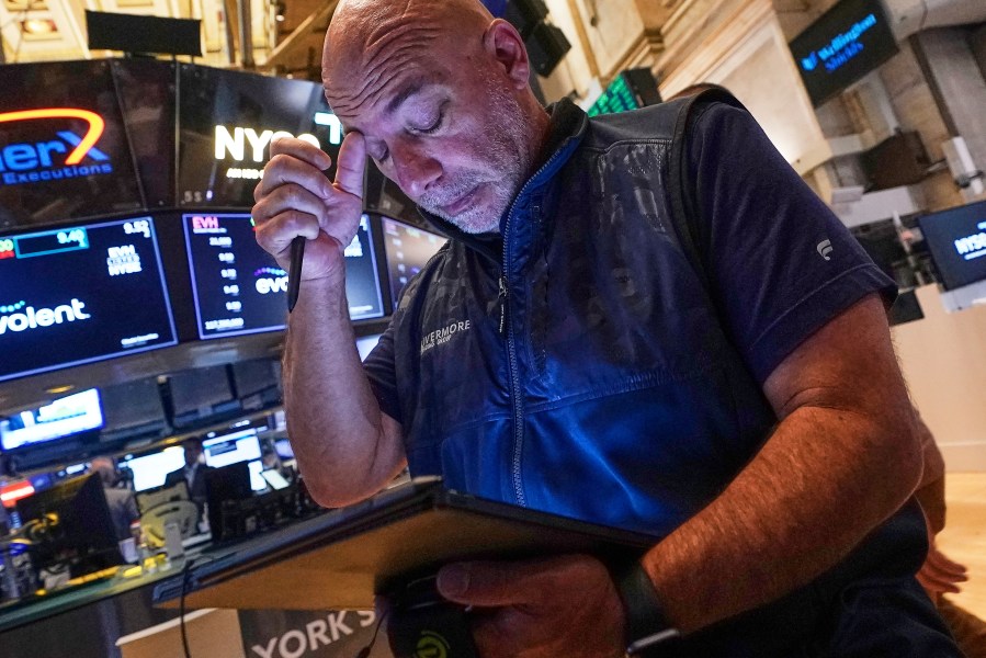 Trader Vincent Napolitano works on the floor of the New York Stock Exchange, Tuesday, July 29, 2025. (AP Photo/Richard Drew)