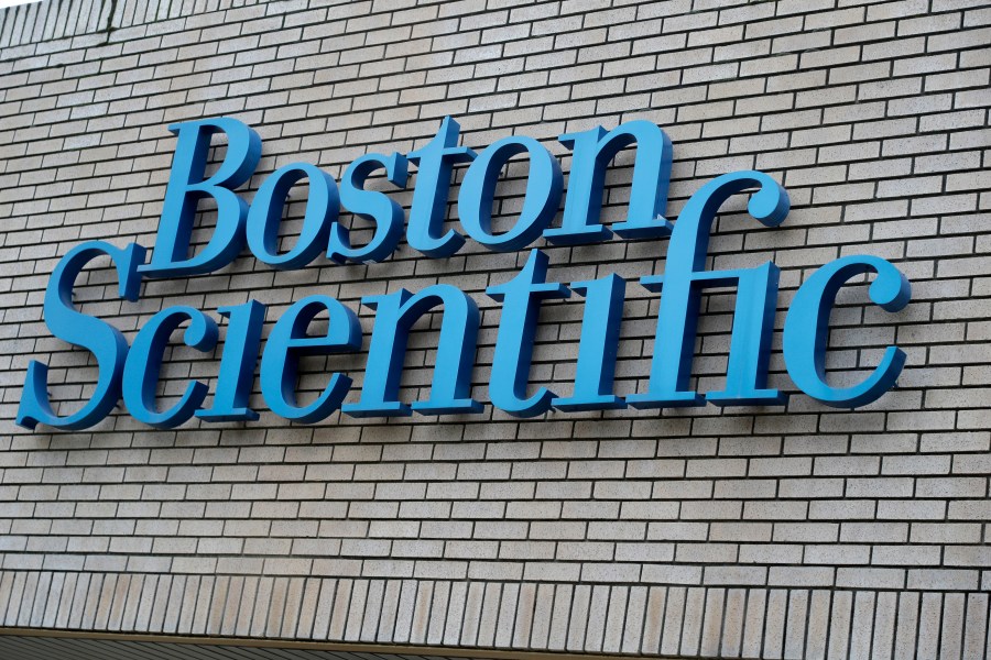 FILE - The Boston Scientific logo is seen at company offices in Fremont, Calif., Feb. 1, 2017. (AP Photo/Marcio Jose Sanchez, File)