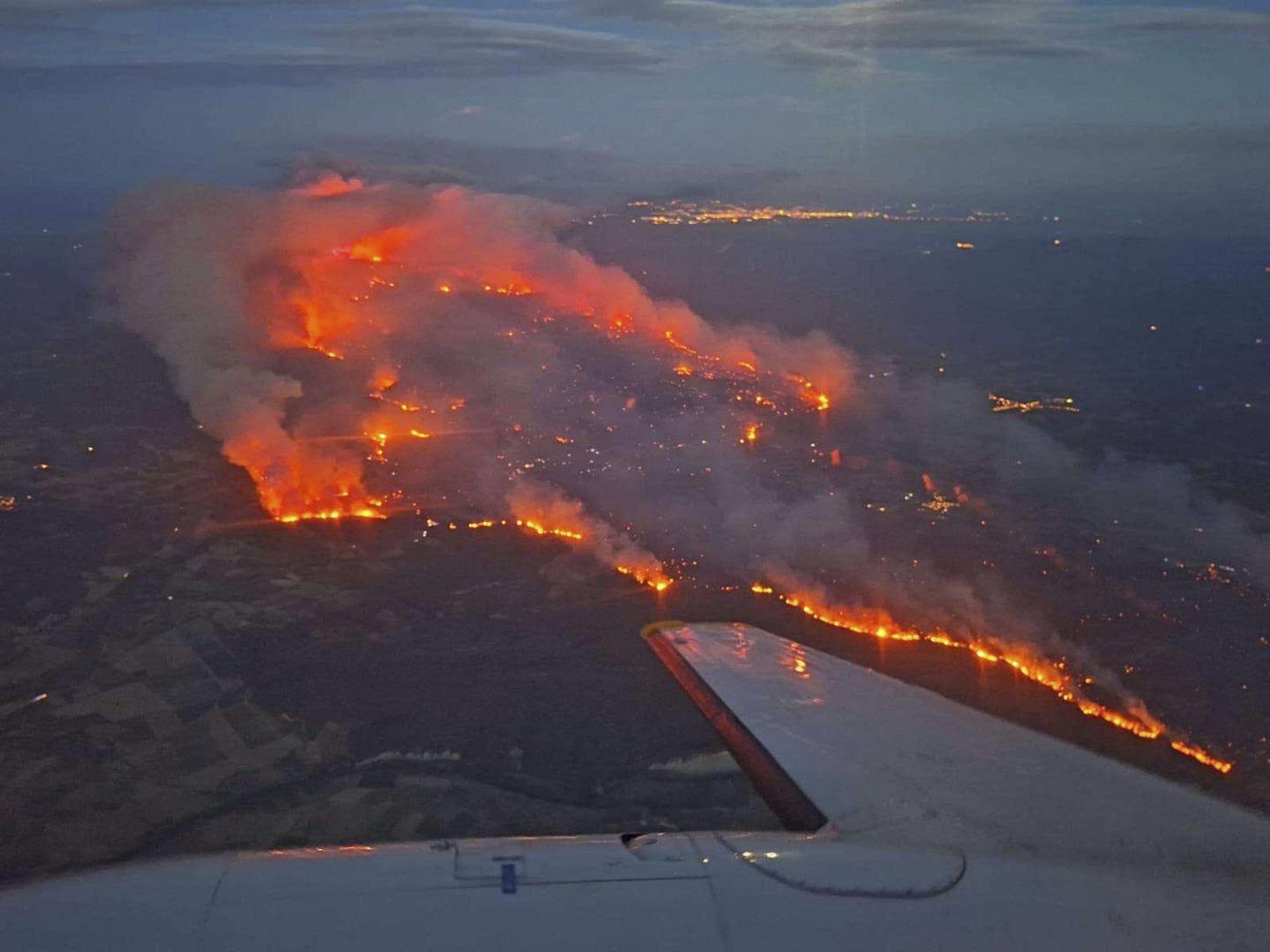 This photo provided by the Securite Civile shows an aerial view of the wildfire in a Mediterranean region near the Spanish border, southern France, Tuesday, Aug. 5, 2025. (Securite Civile via AP)