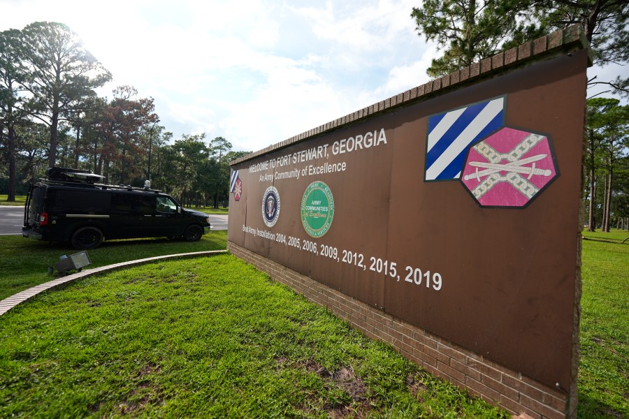 A sign welcoming people to Fort Stewart in Georgia is seen on Wednesday, Aug. 6, 2025. (AP Photo/Mike Stewart)