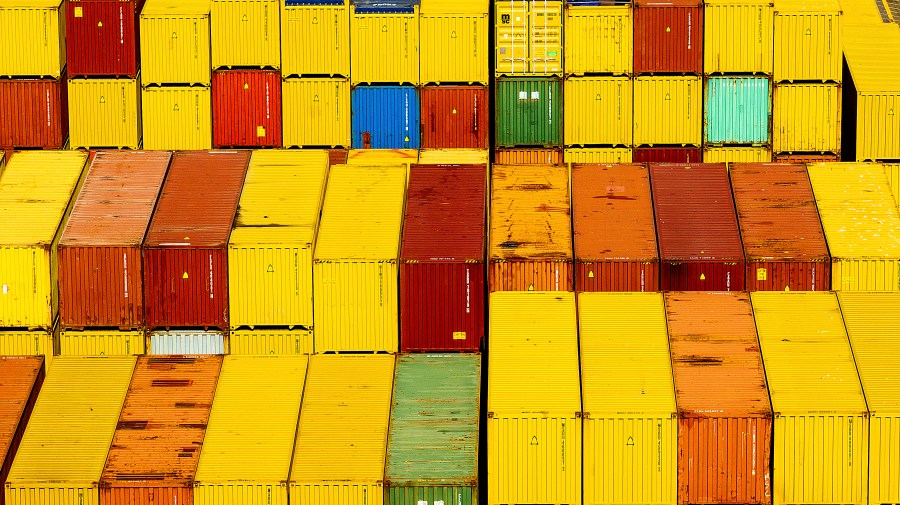 Cargo containers are seen at a shipping terminal at the Port of Oakland on Wednesday, Aug. 6, 2025, in Oakland, Calif. (AP Photo/Noah Berger)
