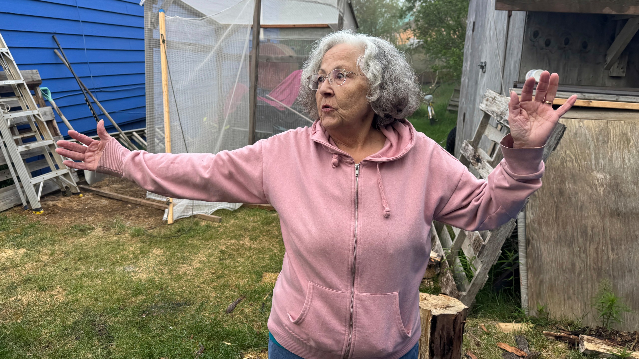Gloria Simeon, co-founder of the Mother Kuskokwim Tribal Coalition, speaks during an interview outside her smokehouse in Bethel, Alaska, on June 18, 2025. (AP Photo/Mark Thiessen)