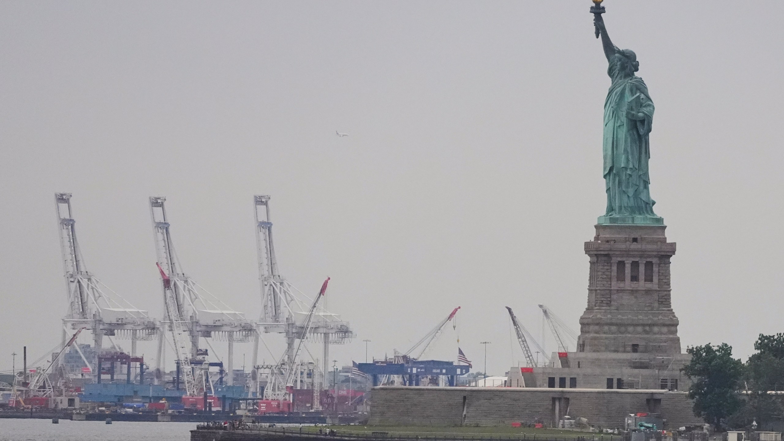 The Statue of Liberty is seen near Port Liberty Terminals, Wednesday, Aug. 6, 2025, in New York. (AP Photo/Frank Franklin II)