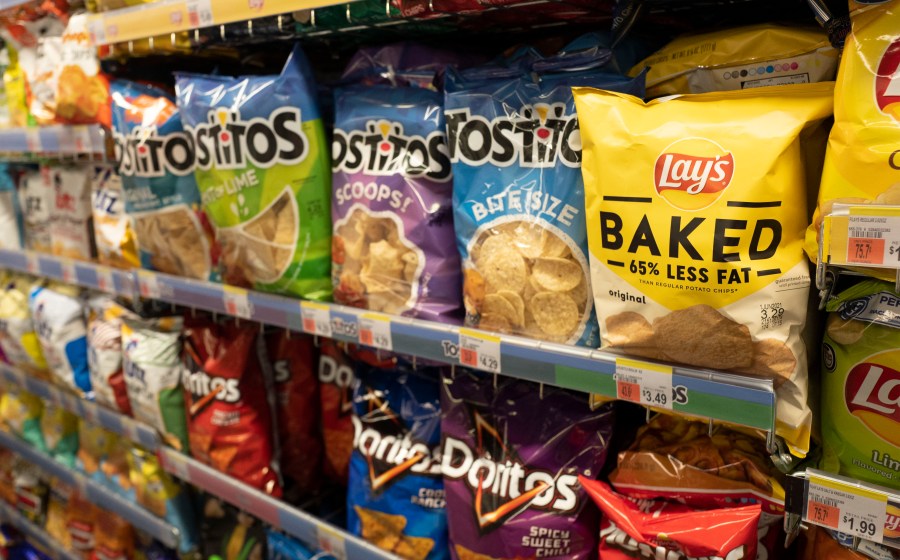 FILE - Potato chips are displayed at a store in New York, March 25, 2021. (AP Photo/Mark Lennihan, file)