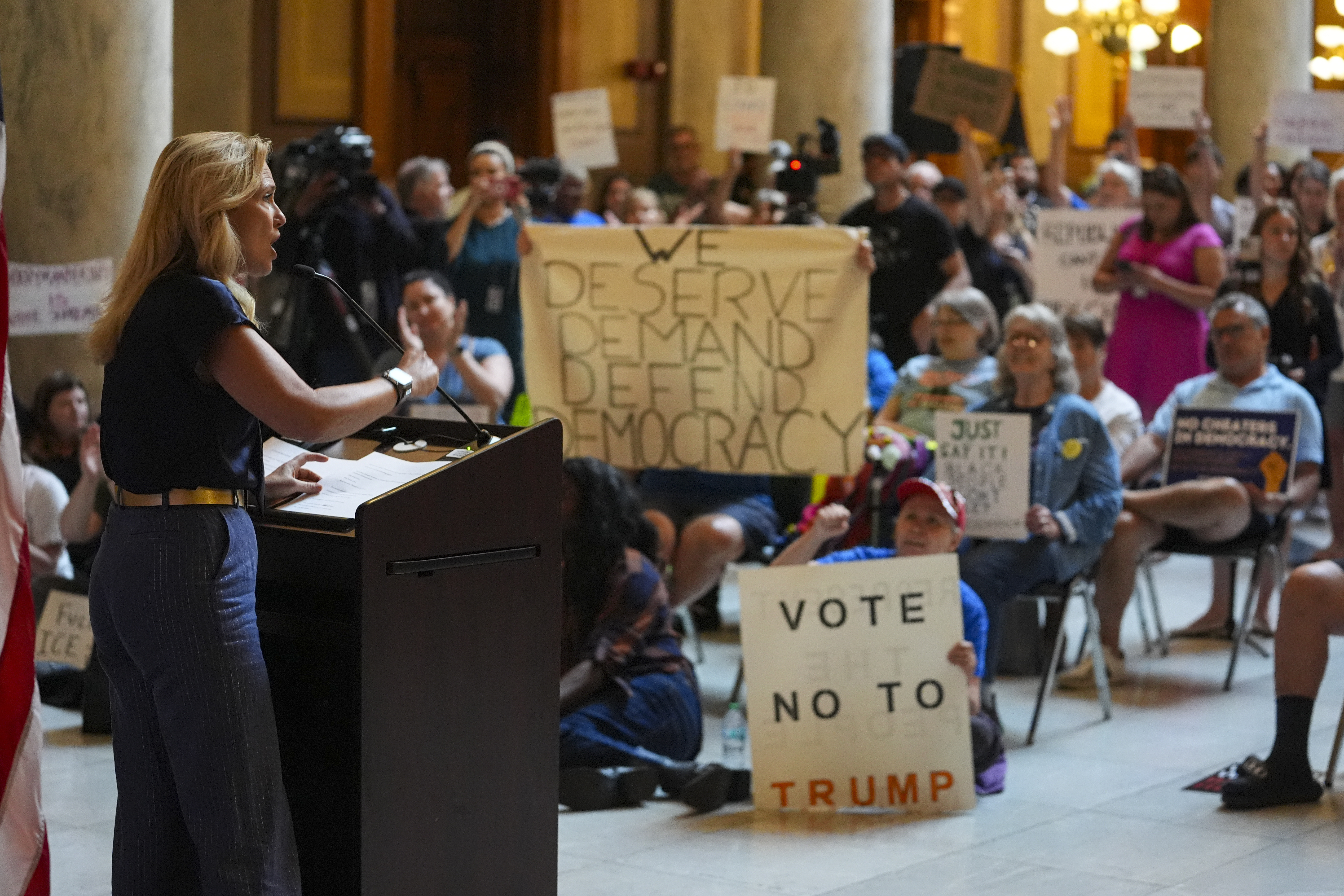 Sen Shelli Yoder, R-Bloomington, speaks at a rally protesting redistricting at the Statehouse in Indianapolis, Thursday, Aug. 7, 2025. (AP Photo/Michael Conroy)