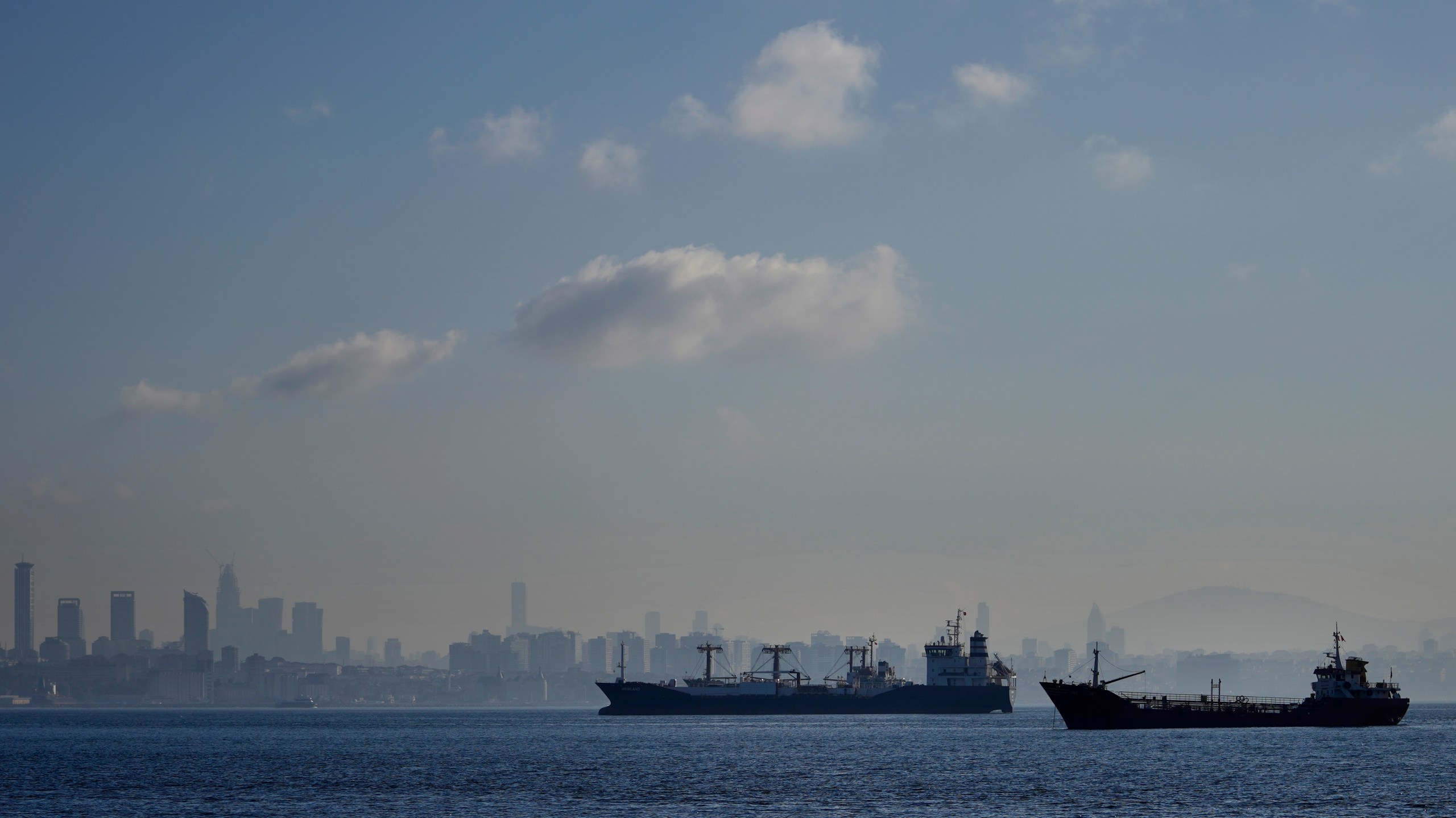 FILE - Cargo ships anchored in the Marmara Sea wait to cross the Bosphorus Straits in Istanbul, Nov. 1, 2022. (AP Photo/Khalil Hamra, File)