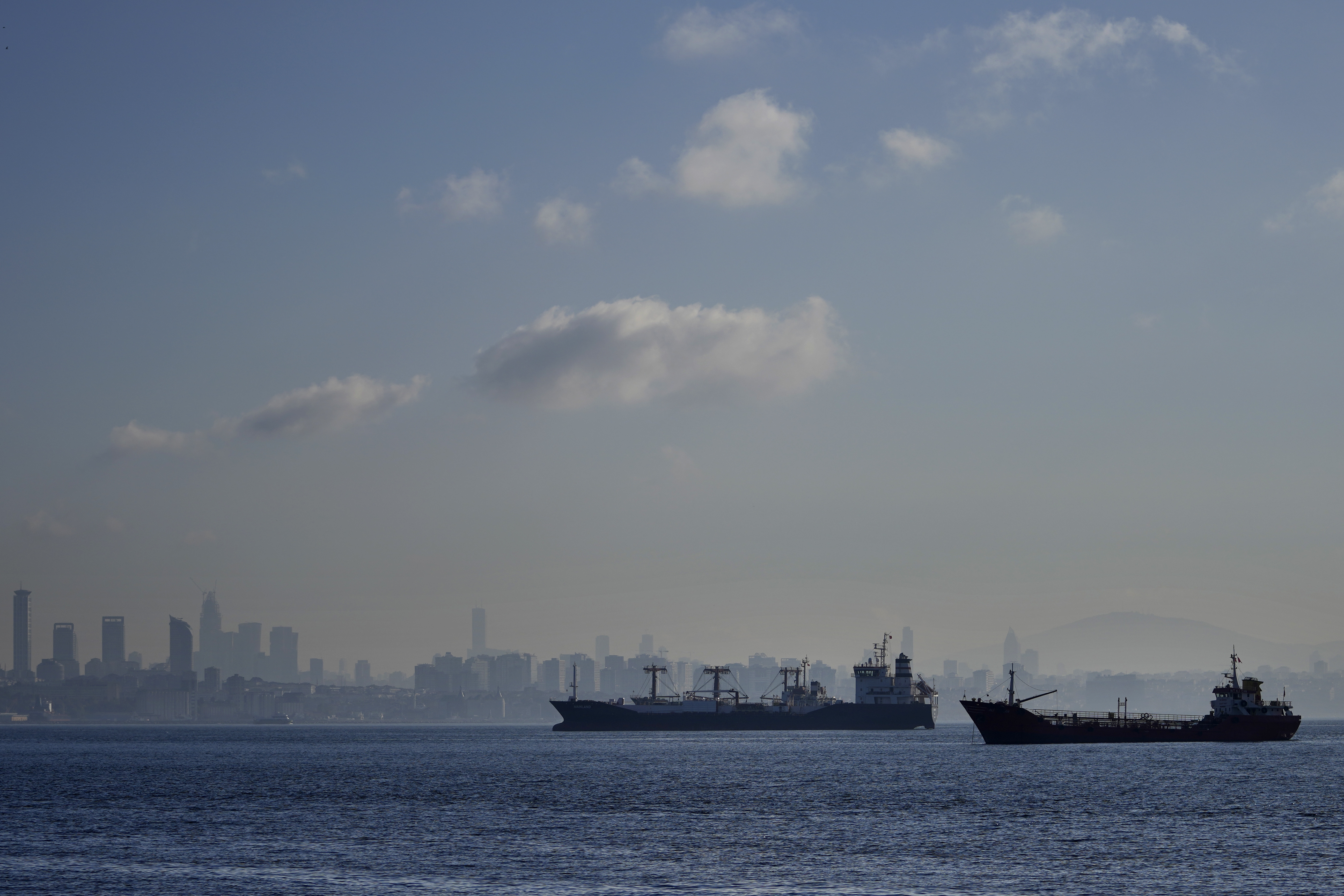 FILE - Cargo ships anchored in the Marmara Sea wait to cross the Bosphorus Straits in Istanbul, Nov. 1, 2022. (AP Photo/Khalil Hamra, File)