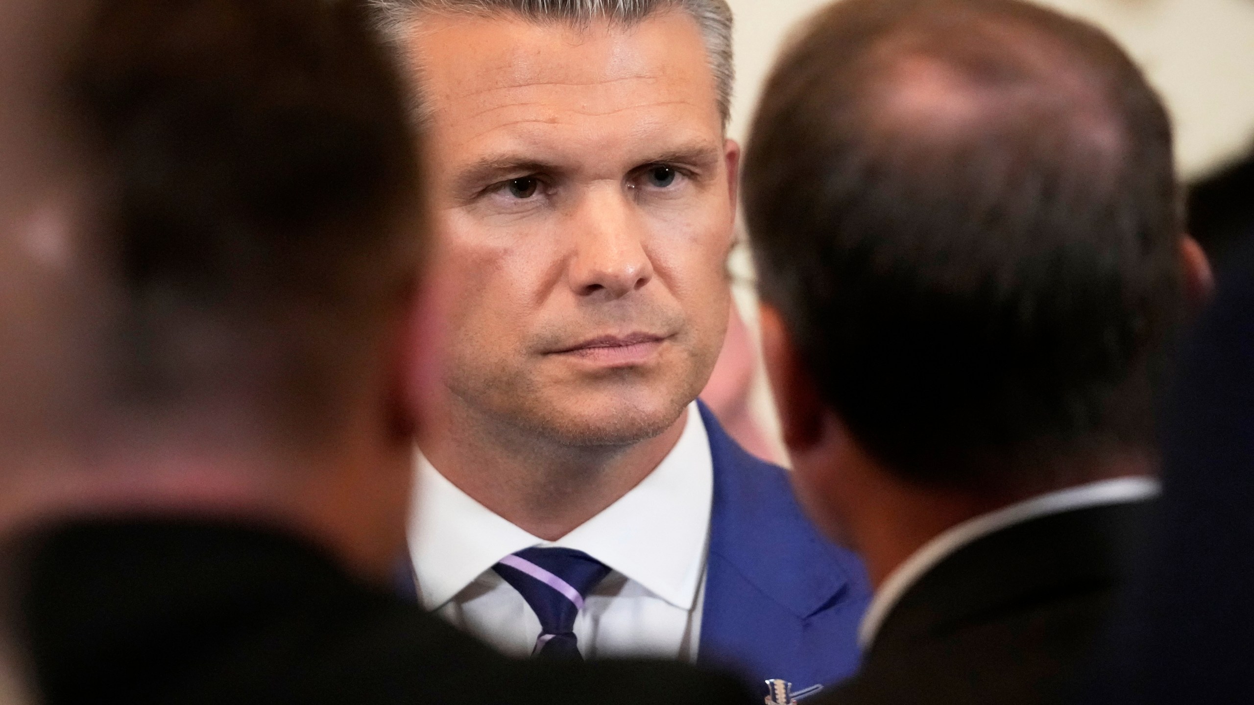Defense Secretary Pete Hegseth attends an event to mark National Purple Heart Day in the East Room of the White House, Thursday, Aug. 7, 2025, in Washington. (AP Photo/Mark Schiefelbein)