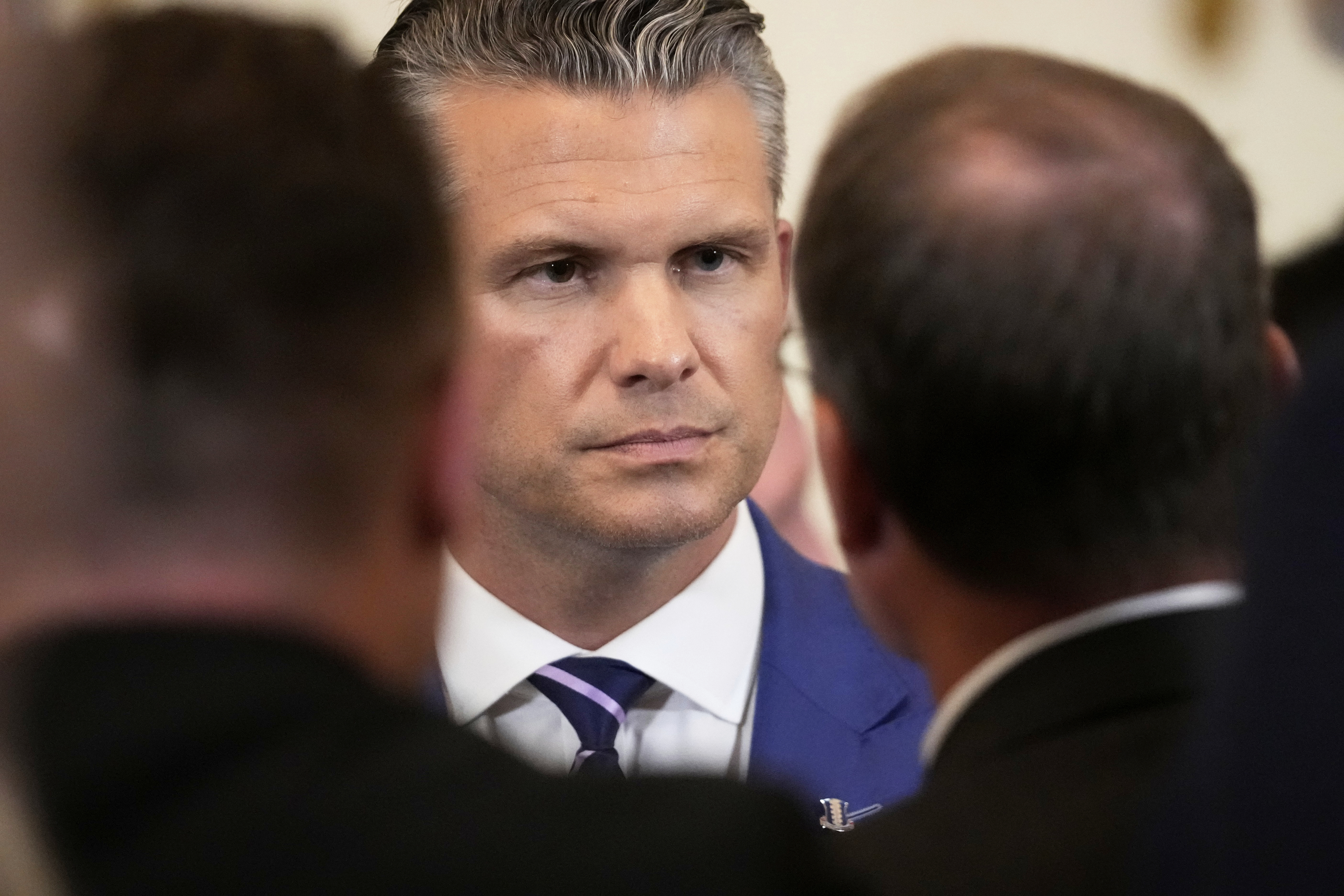 Defense Secretary Pete Hegseth attends an event to mark National Purple Heart Day in the East Room of the White House, Thursday, Aug. 7, 2025, in Washington. (AP Photo/Mark Schiefelbein)