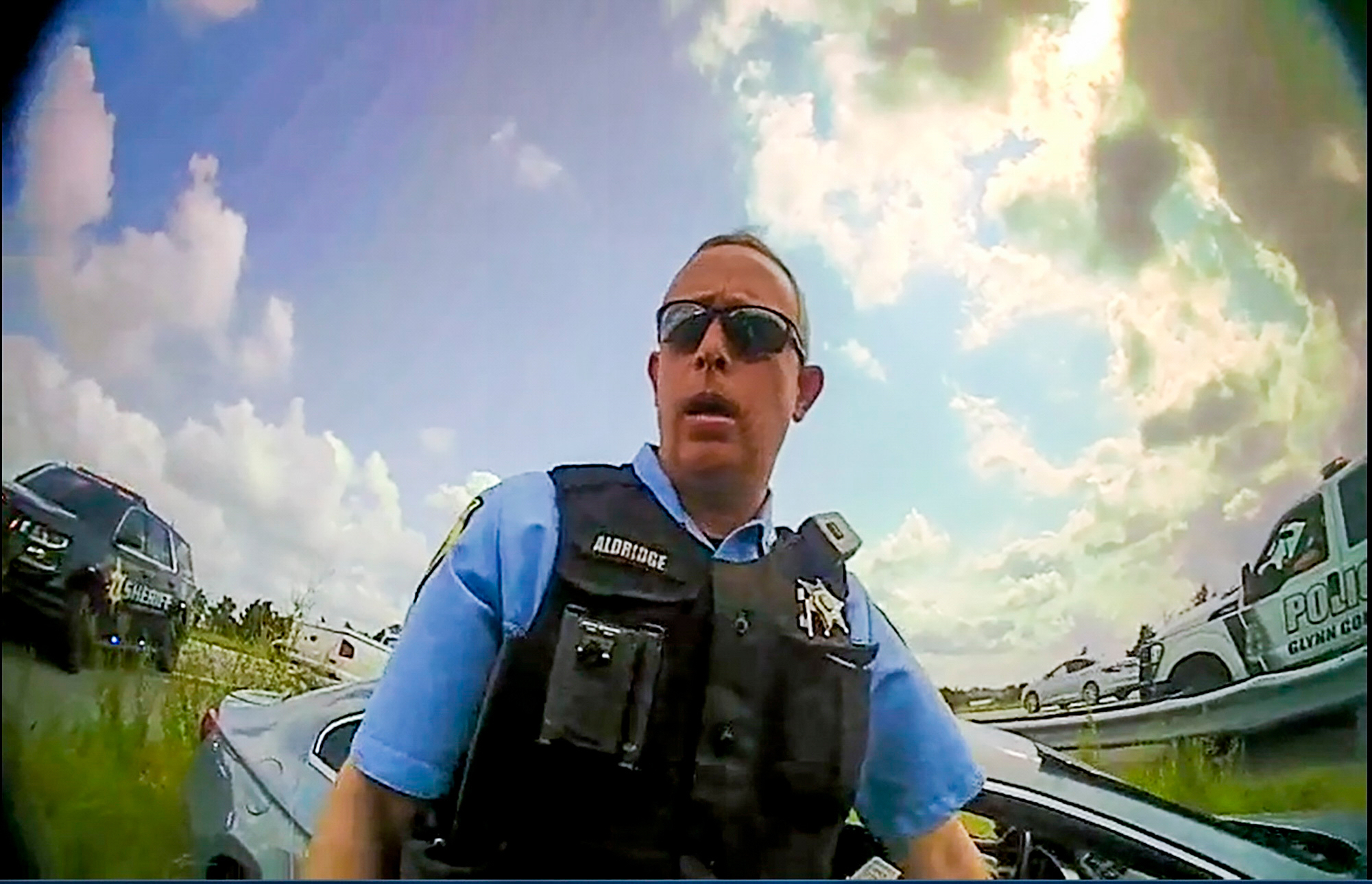 FILE - This still image from a deputy's body camera video provided by the Camden County Sheriff's Office shows Staff Sgt. Buck Aldridge following a chase and arrest in Camden County, Ga., June 24, 2022. (Camden County Sheriff's Office via AP, File)