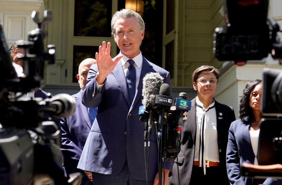 California Gov. Gavin Newsom calls for a new way for California to redraw it's voting districts during a news conference In Sacramento, Calif., Friday July 25, 2025. (AP Photo/Rich Pedroncelli)
