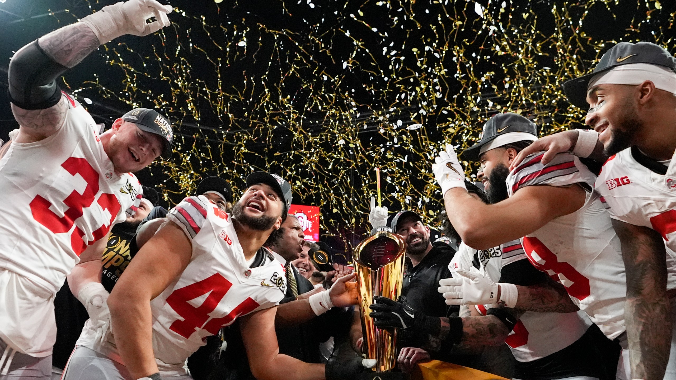 FILE - Ohio State celebrates after their win against Notre Dame in the College Football Playoff national championship game Jan. 20, 2025, in Atlanta. (AP Photo/Brynn Anderson, File)