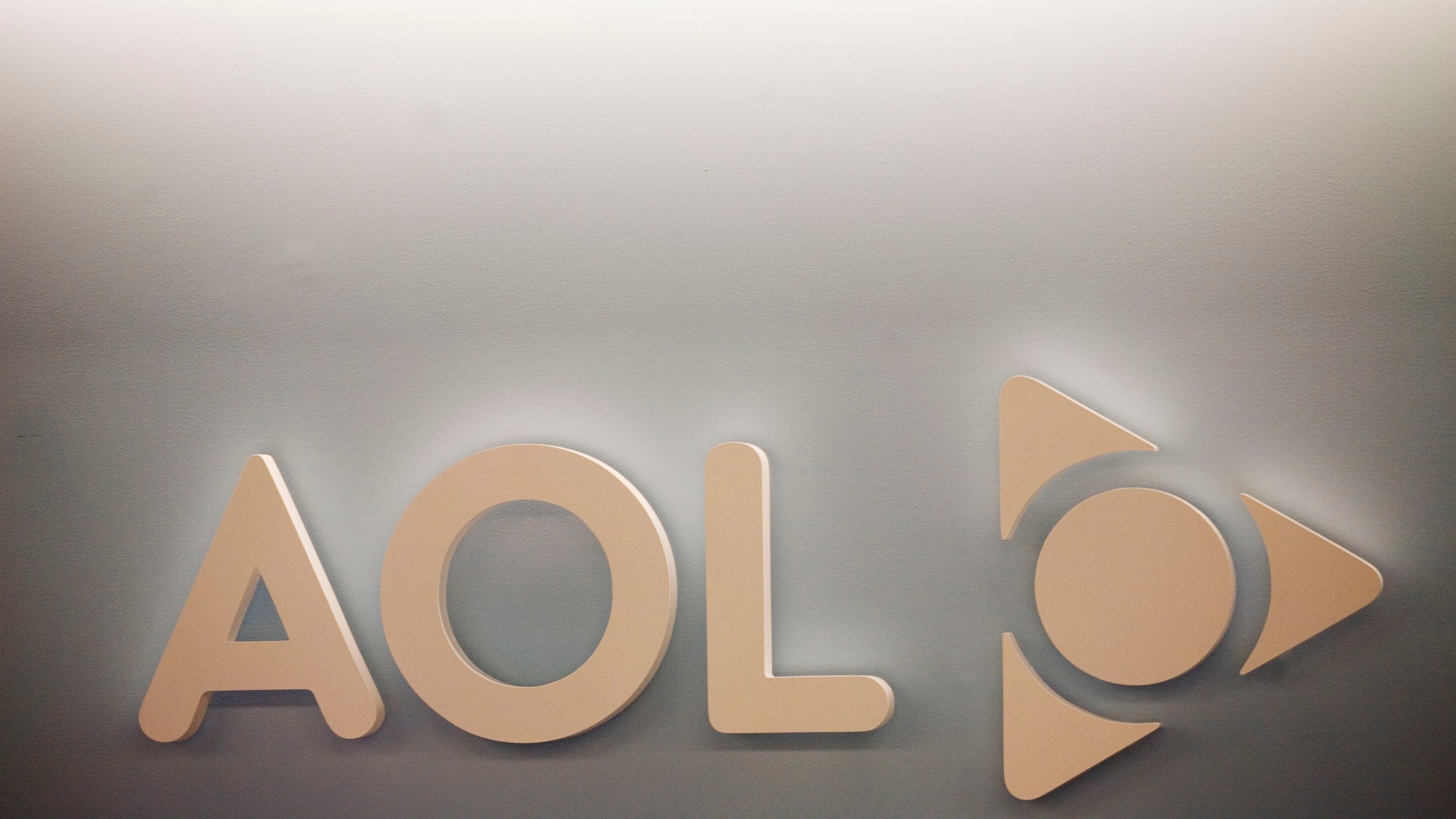FILE - The AOL logo is shown on a wall of the company's New York office, on Monday, May 12, 2008. (AP Photo/Mark Lennihan, File)