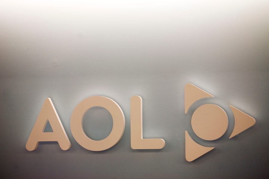 FILE - The AOL logo is shown on a wall of the company's New York office, on Monday, May 12, 2008. (AP Photo/Mark Lennihan, File)