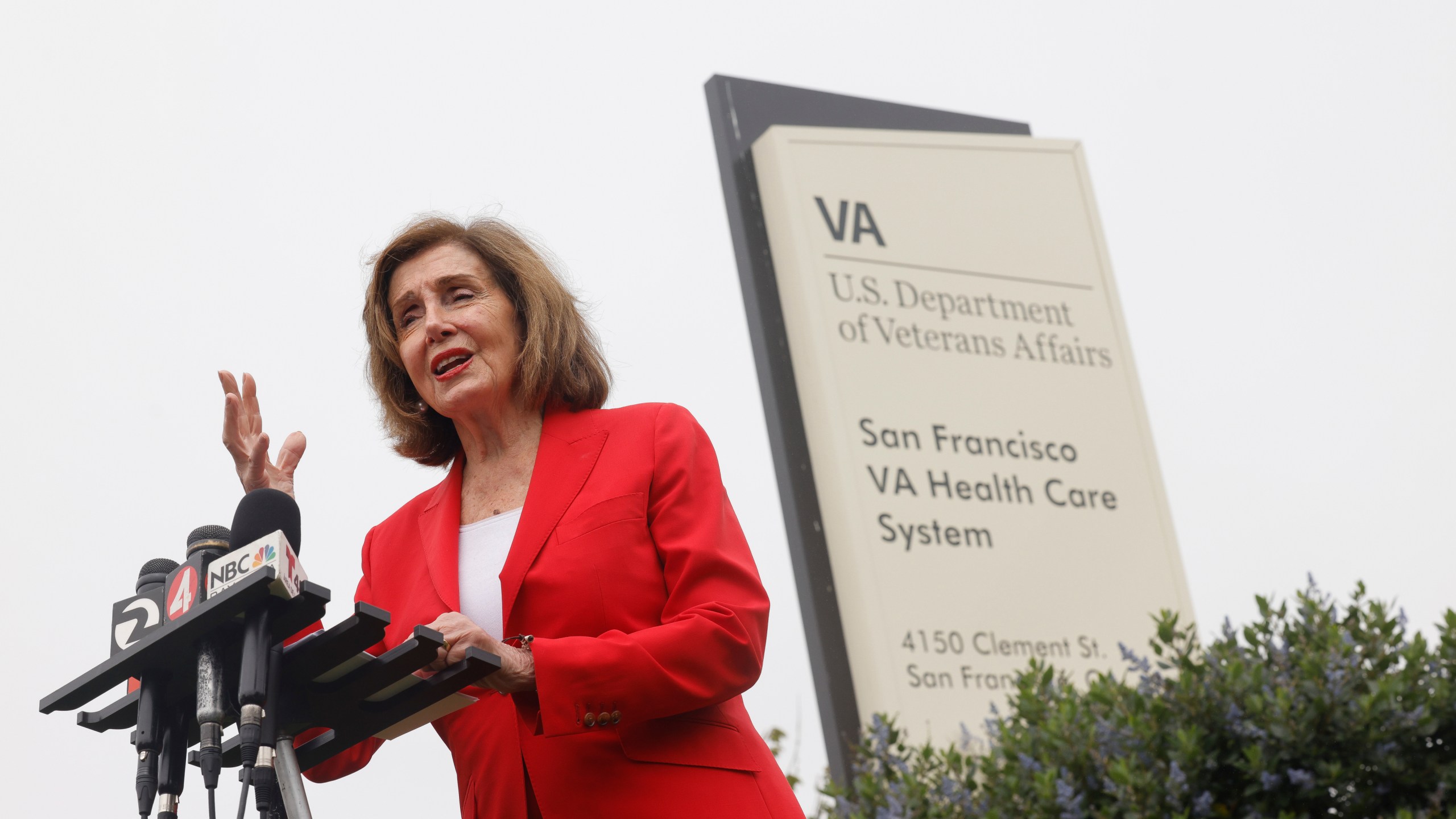 Democratic Rep. Nancy Pelosi speaks on the corner of Clement Street and 42nd Avenue after touring the San Francisco VA Medical Center and meeting VA officials to mark House Democrats' Honor Our Veterans Day of Action on Thursday, Aug. 7, 2025, in San Francisco. (Lea Suzuki/San Francisco Chronicle via AP)