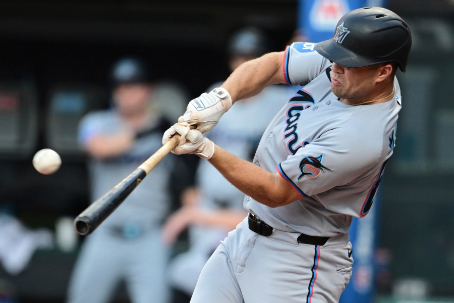 Miami Marlins' Jakob Marsee hits a three run home run off Cleveland Guardians starting pitcher Gavin Williams during the first inning of a baseball game, Wednesday, Aug. 13, 2025, in Cleveland. (AP Photo/David Dermer)