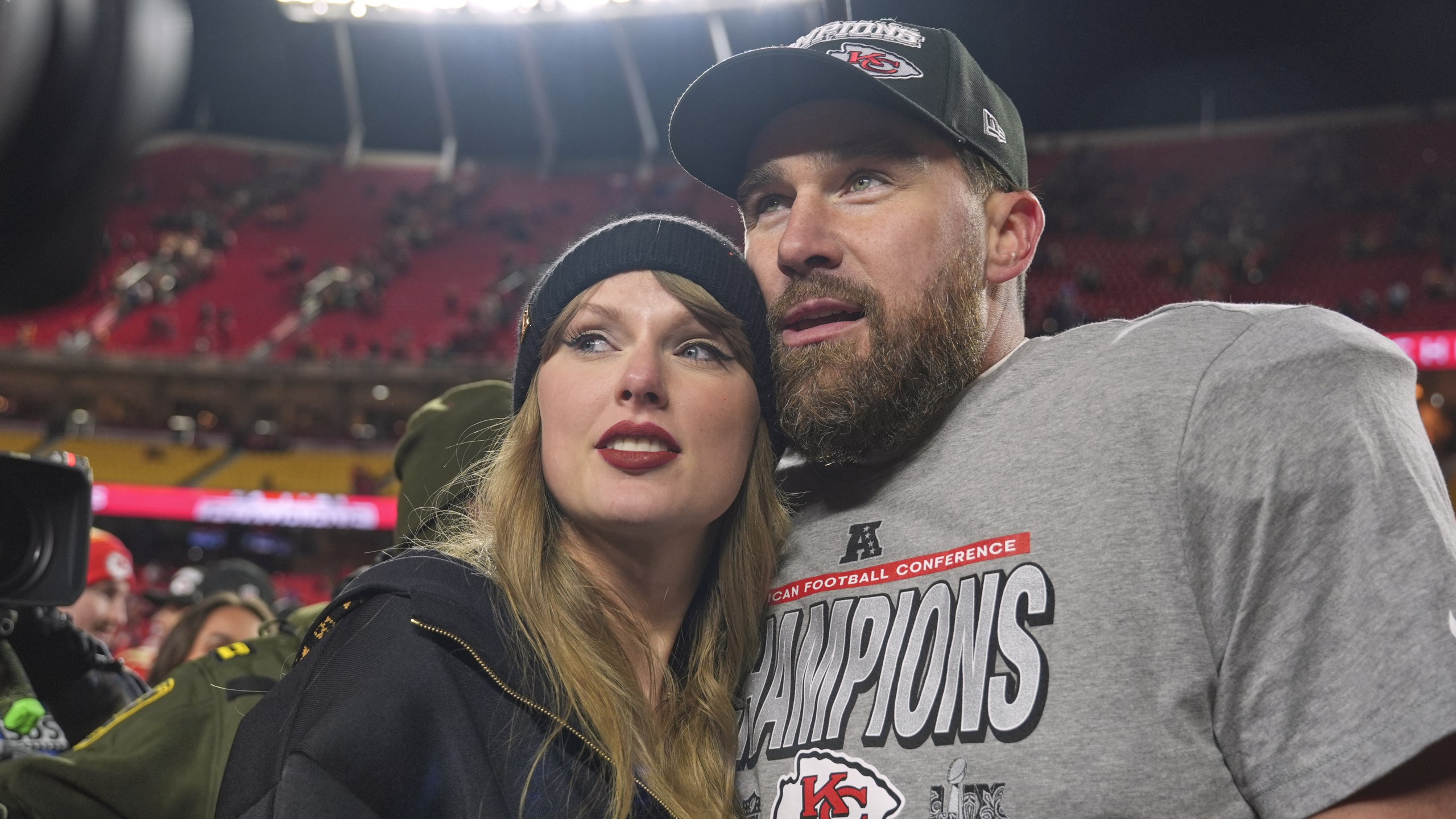 FILE - Kansas City Chiefs tight end Travis Kelce, right, appears with singer Taylor Swift after the Chiefs victory over the Buffalo Bills in the AFC Championship game in Kansas City, Mo., on Jan. 26, 2025. (AP Photo/Charlie Riedel, File)
